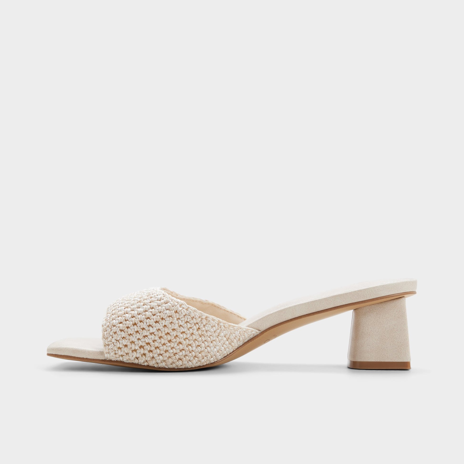 Side view of Beige Aneka Heeled mule