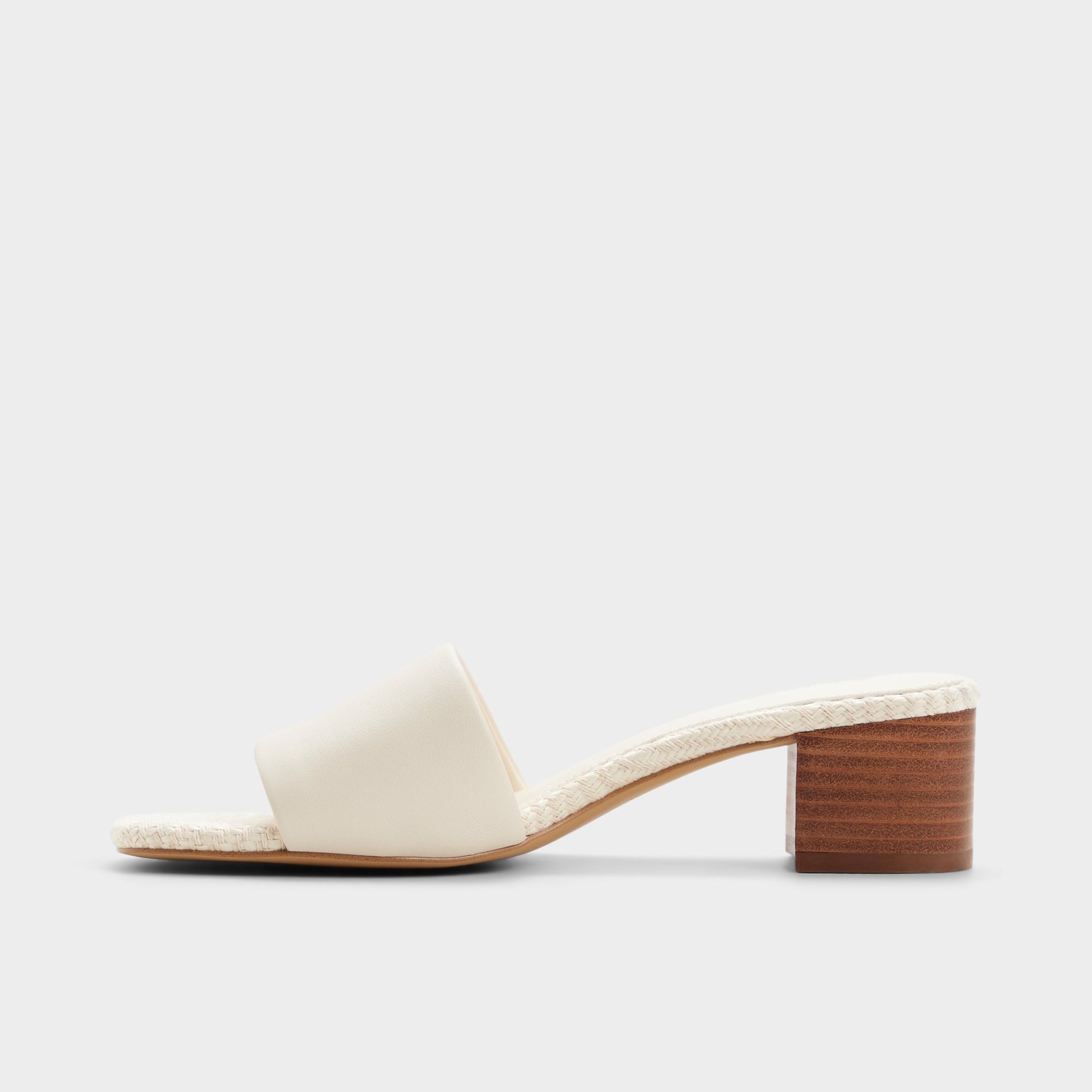 Side view of Other white Claudina Heeled mule