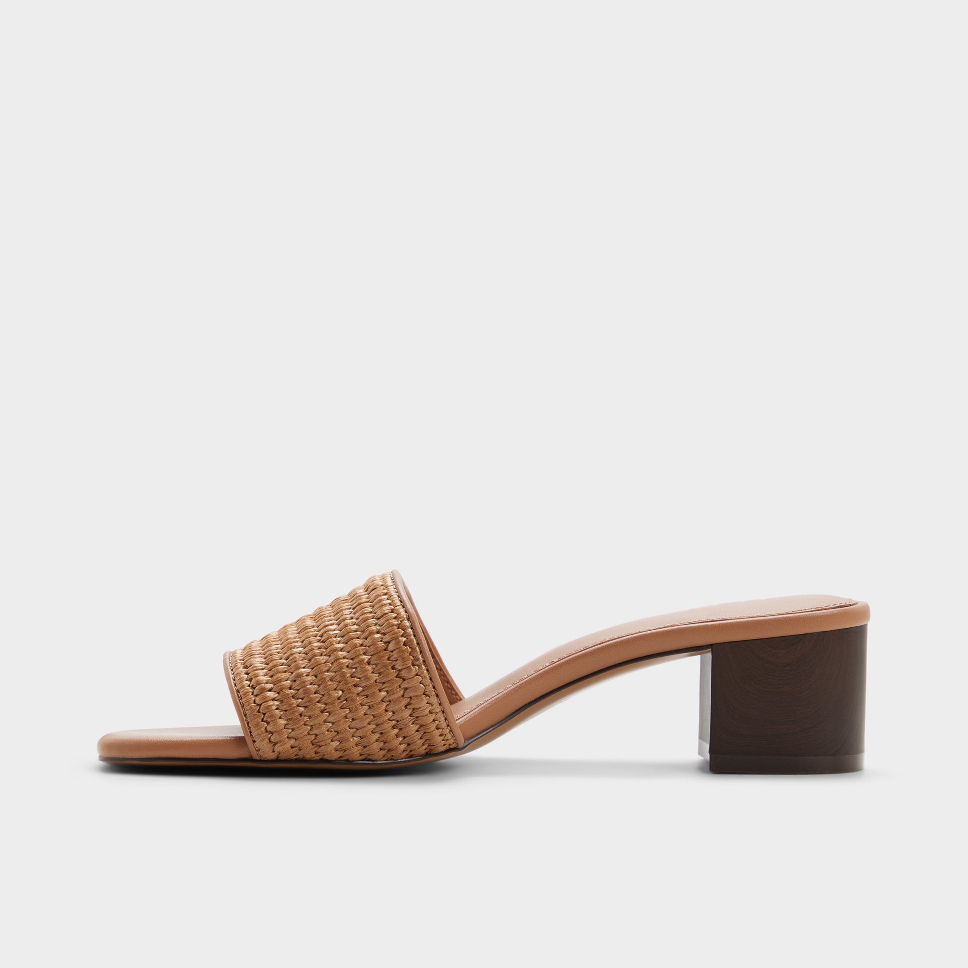 Side view of Brown Claudina Heeled mule