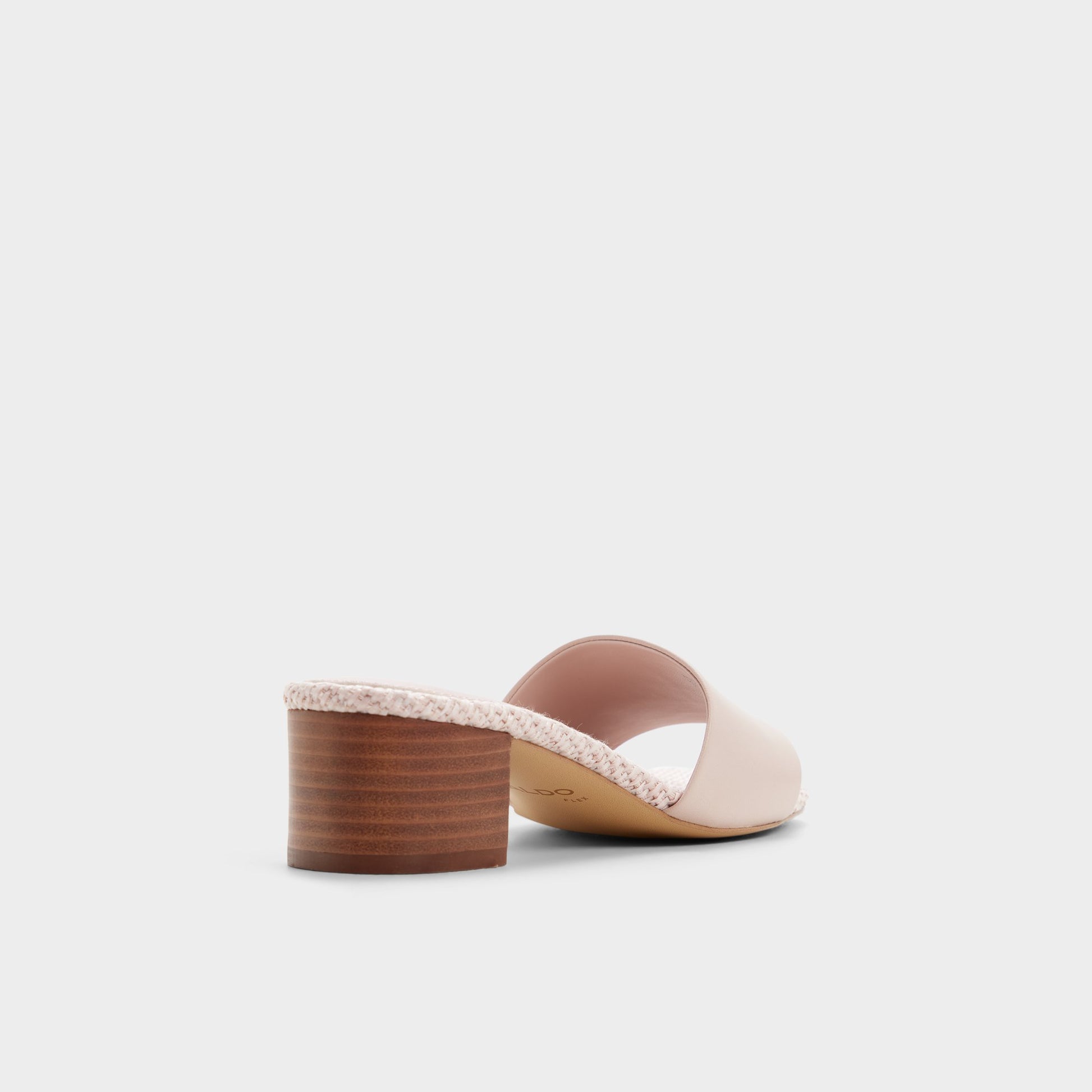 Three-quarter angle of Other pink Claudina Heeled mule's back side