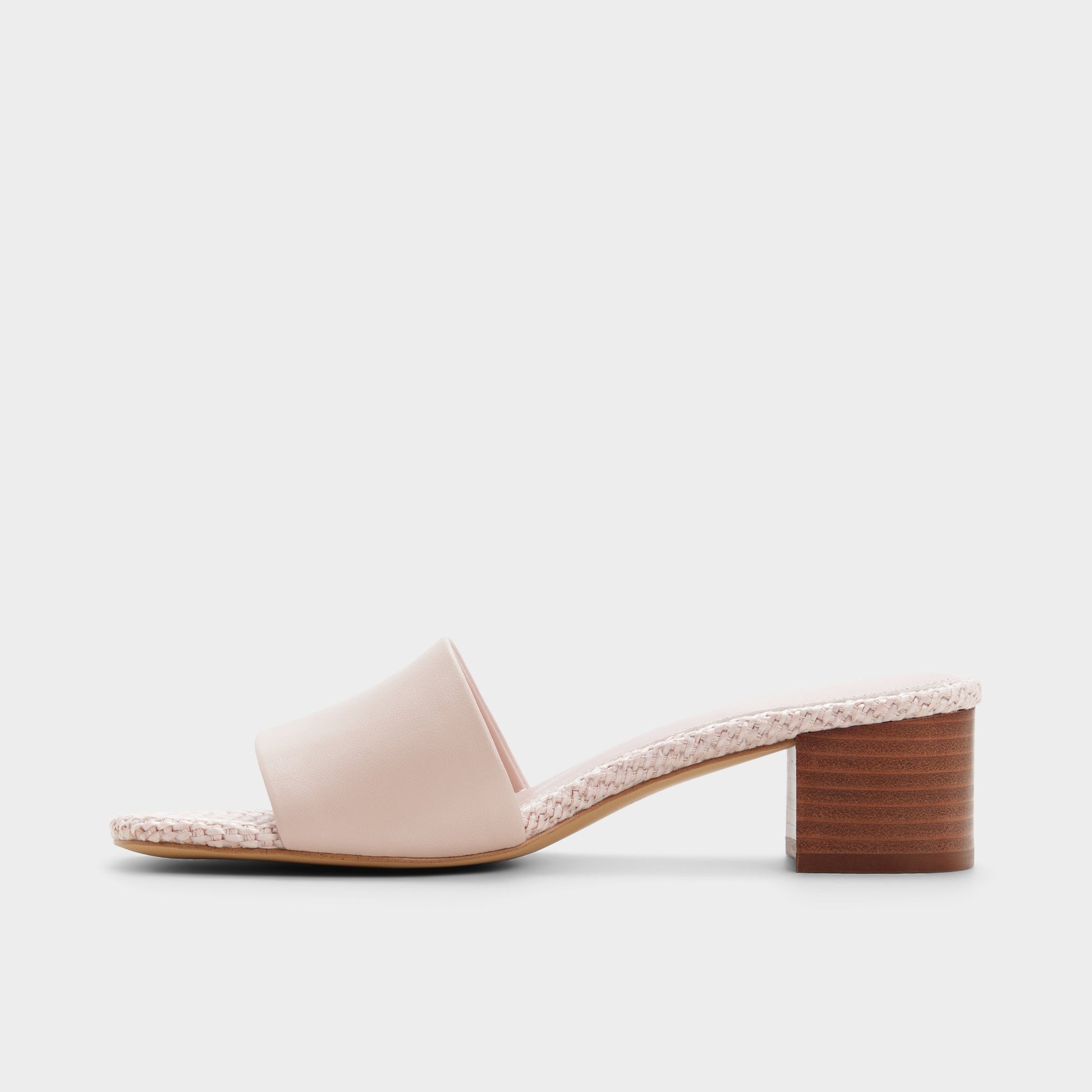 Side view of Other pink Claudina Heeled mule