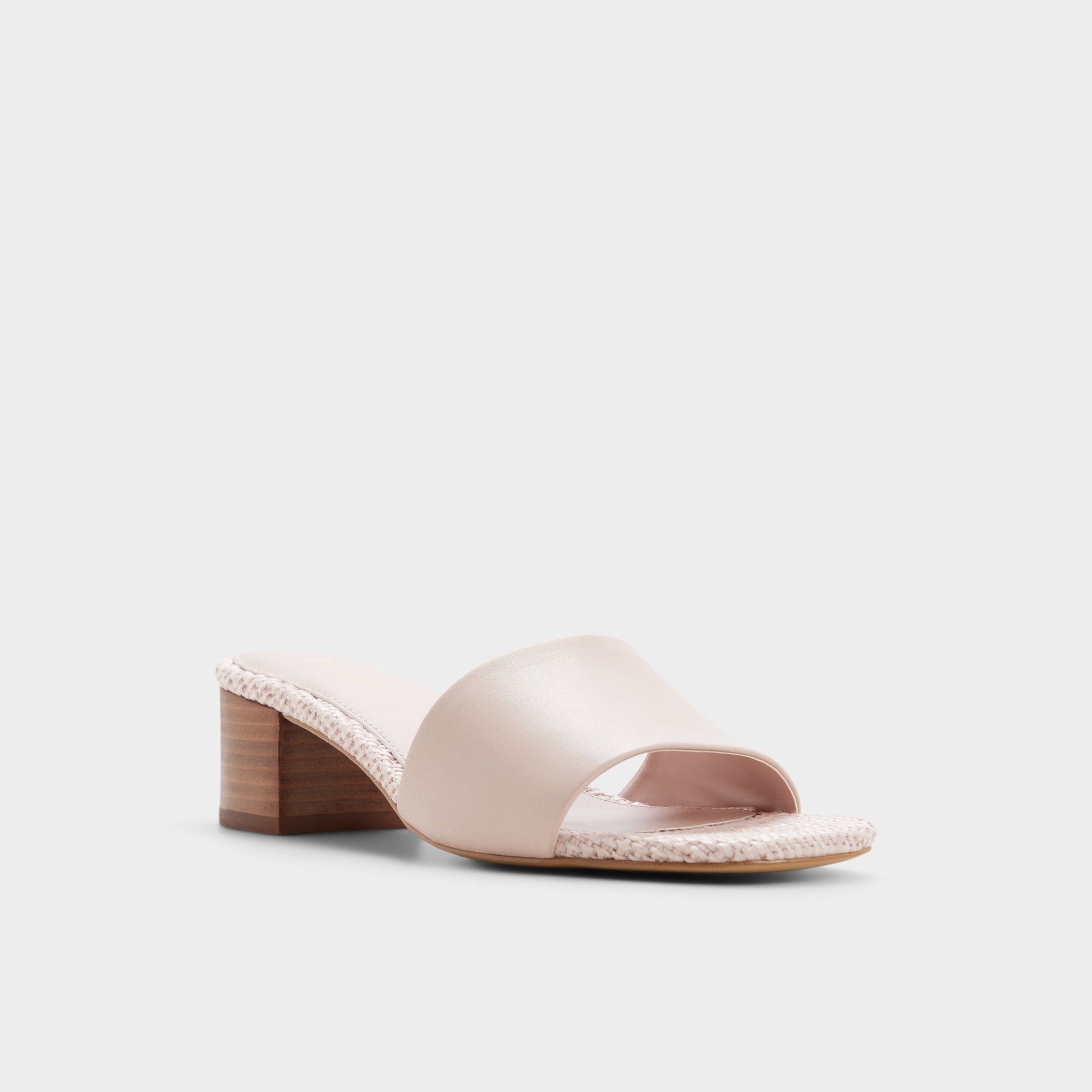 Three-quarter angle of Other pink Claudina Heeled mule's front side