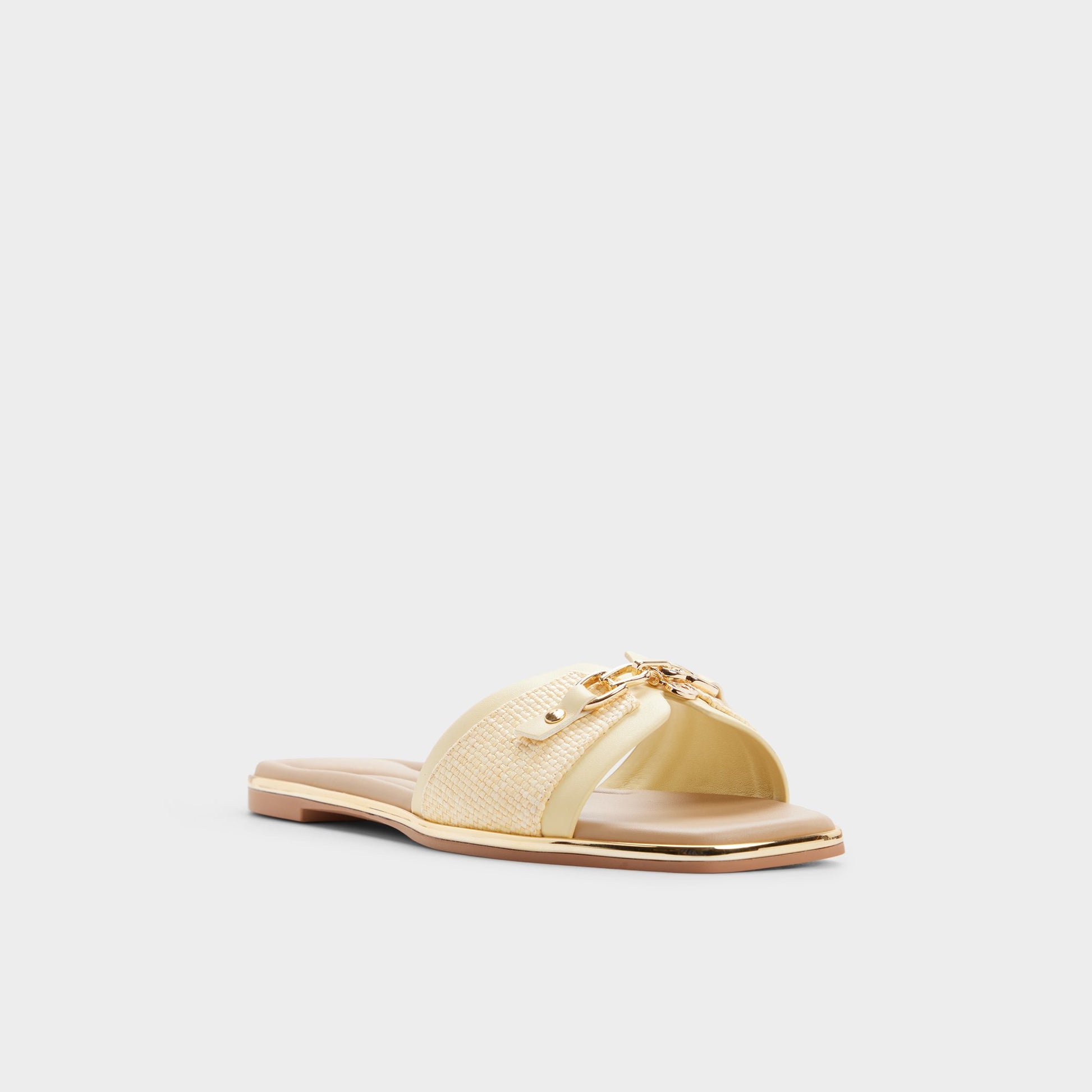 Three-quarter angle of Light yellow Alamassi Slide sandal's front side