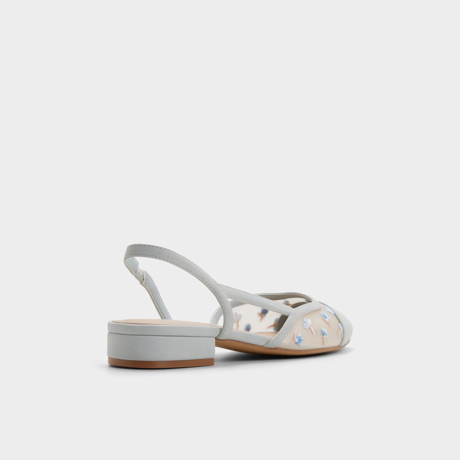 Three-quarter angle of Tan Clementinne Slingback heel's back side