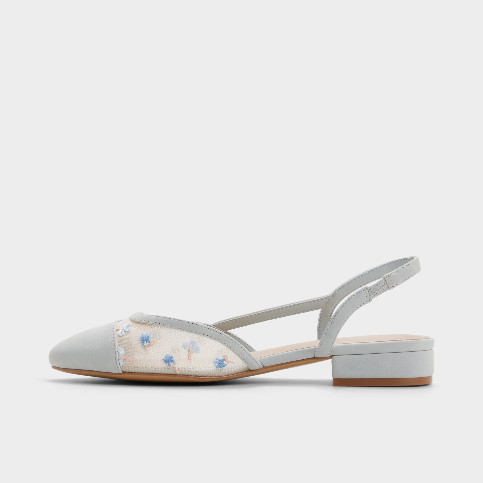 Side view of Tan Clementinne Slingback high heel