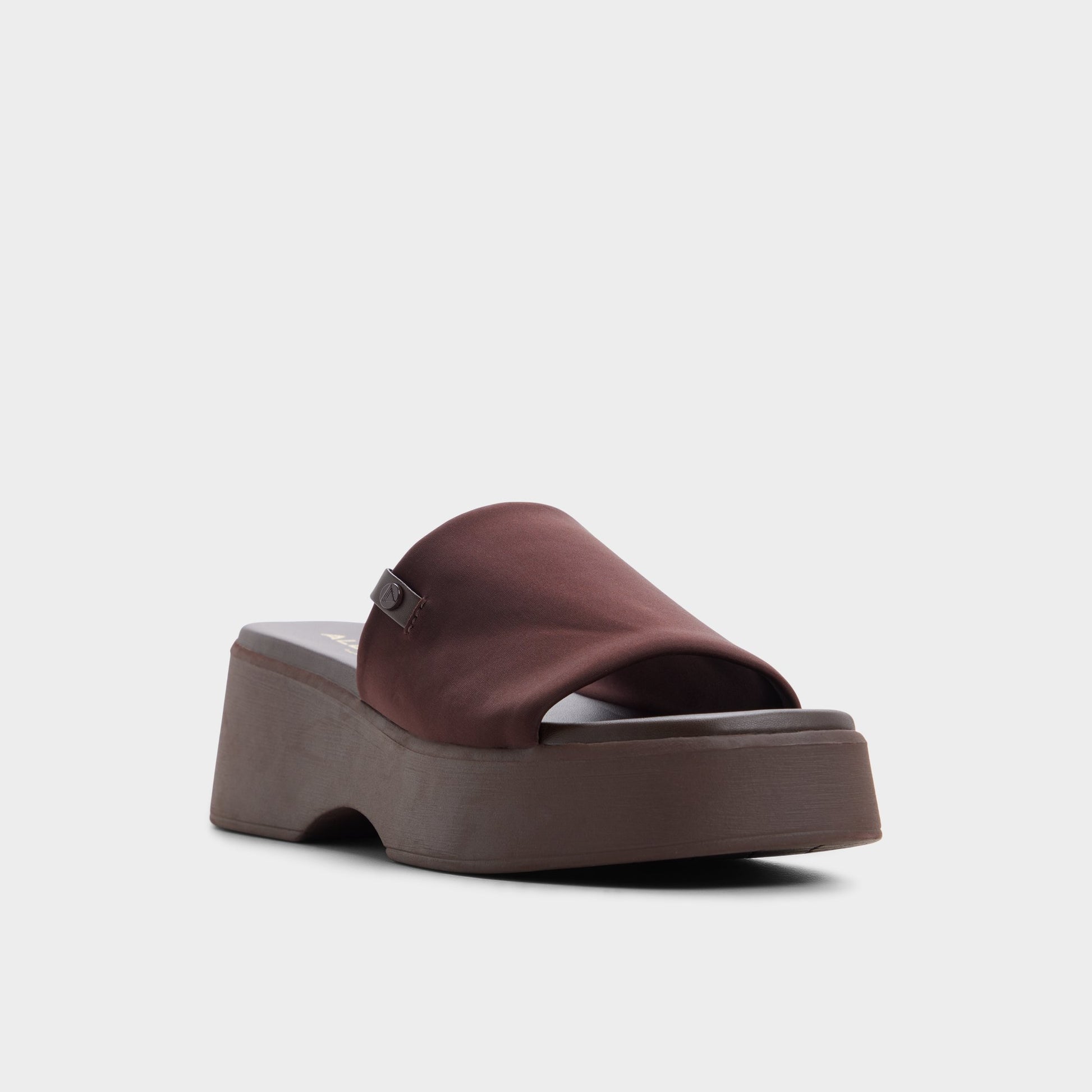 Three-quarter angle of Dark brown Yassu Wedge sandal's front side
