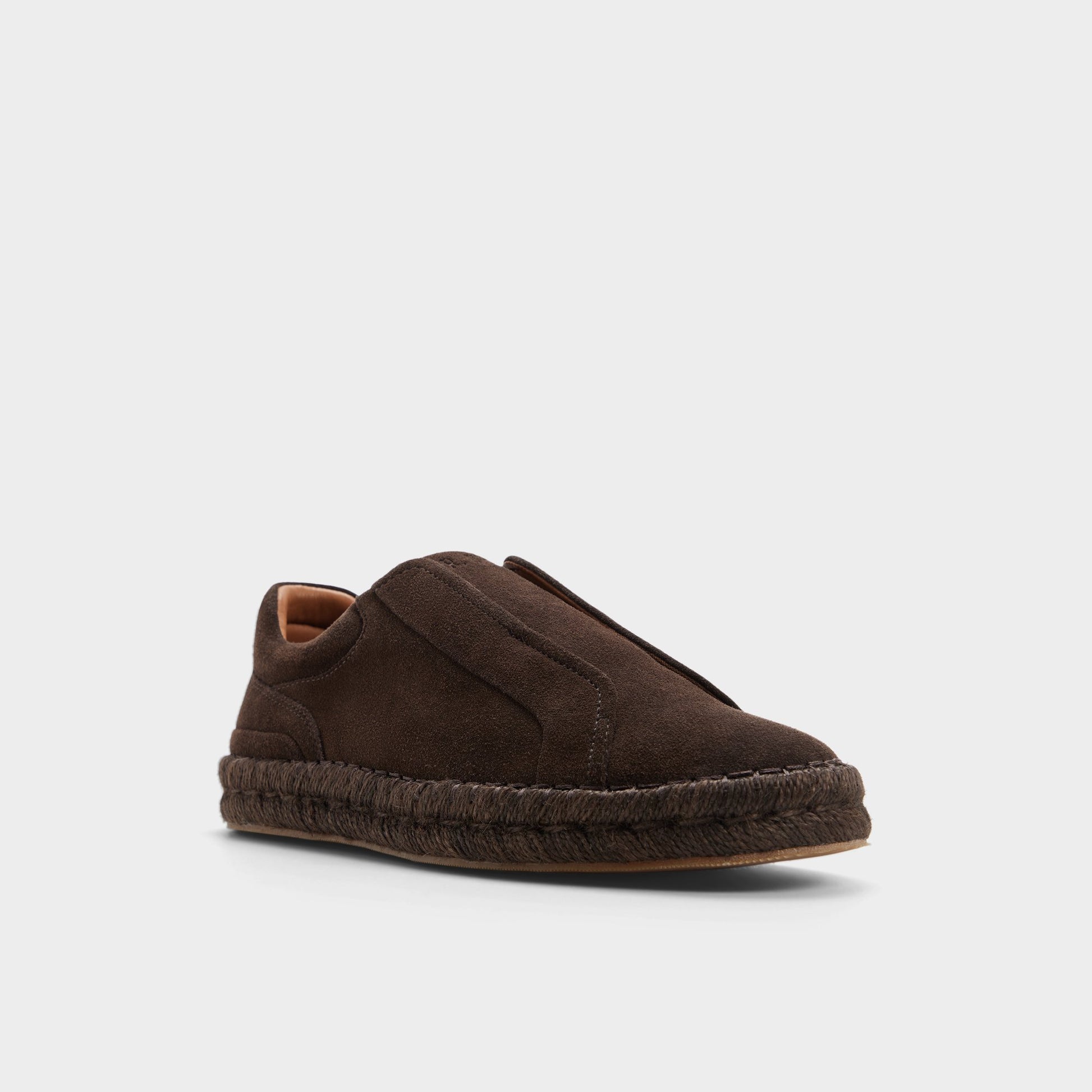 Three-quarter angle of Dark brown Barkley Slip-on's front side