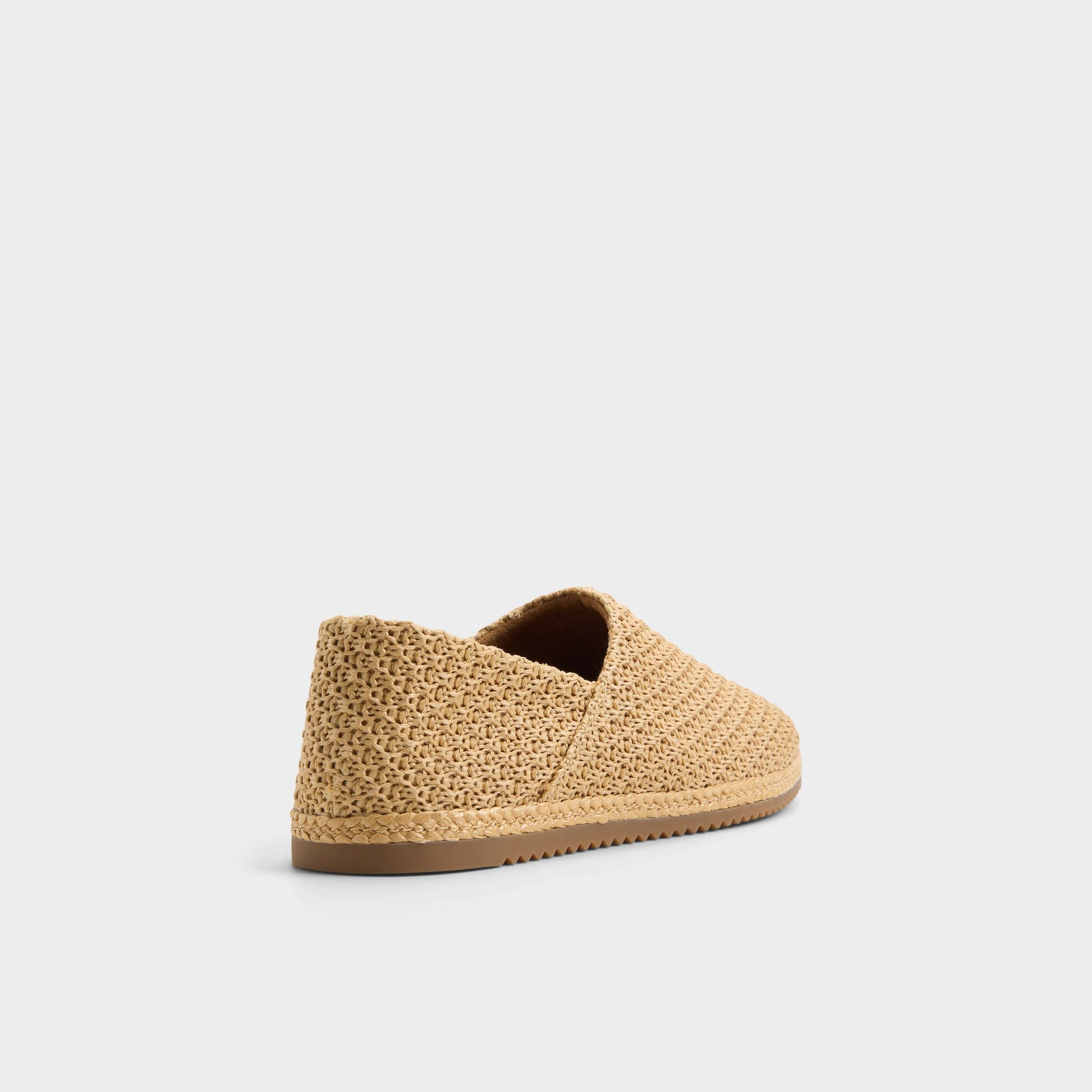Three-quarter angle of Natural Blazing Slip-on's back side