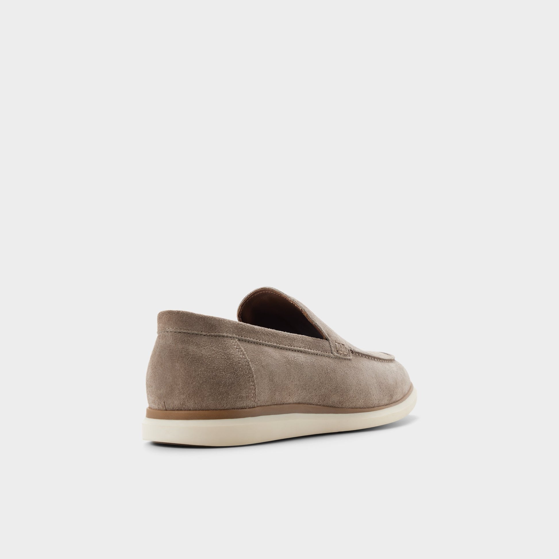 Three-quarter angle of Taupe Stark Slip-on's back side