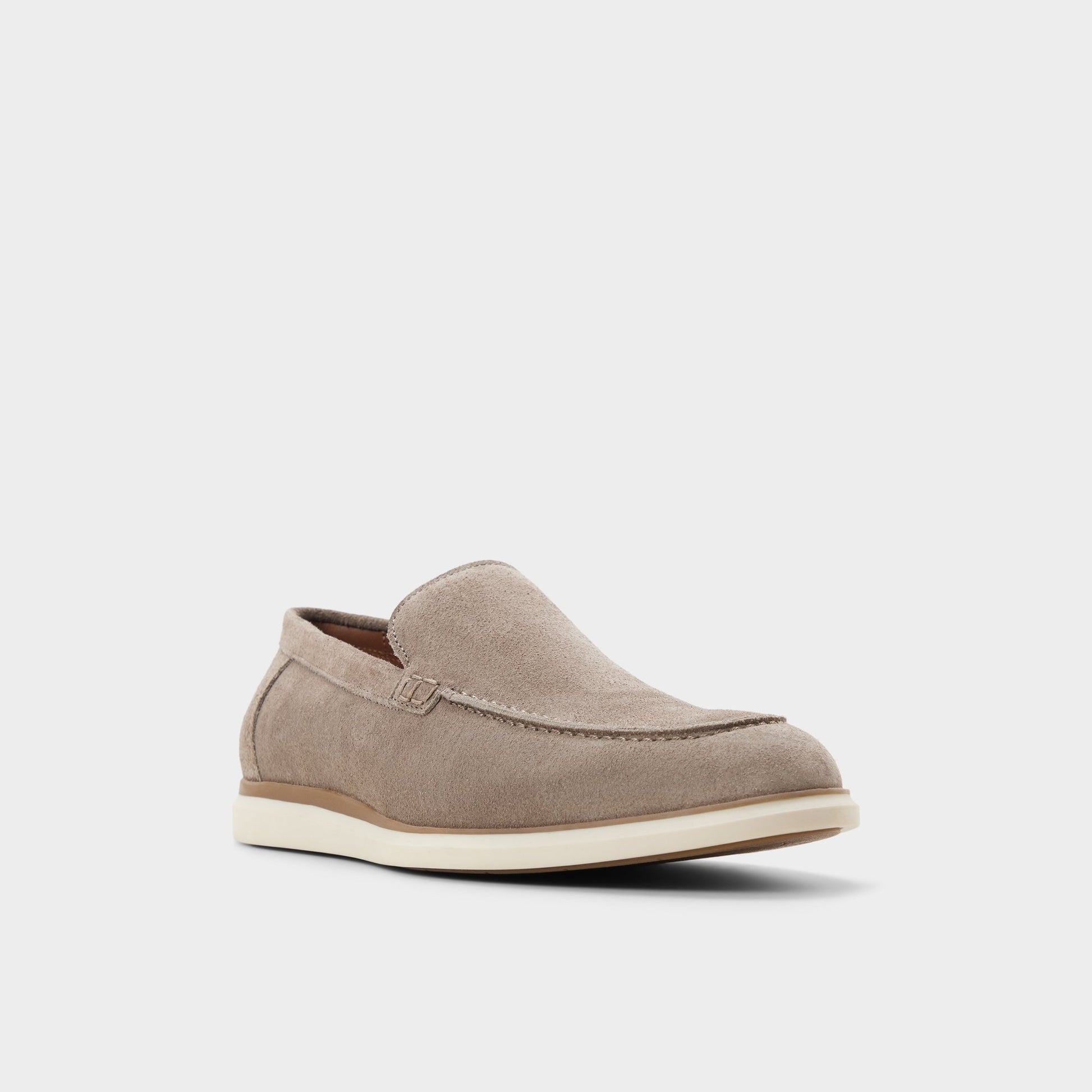 Three-quarter angle of Taupe Stark Slip-on's front side