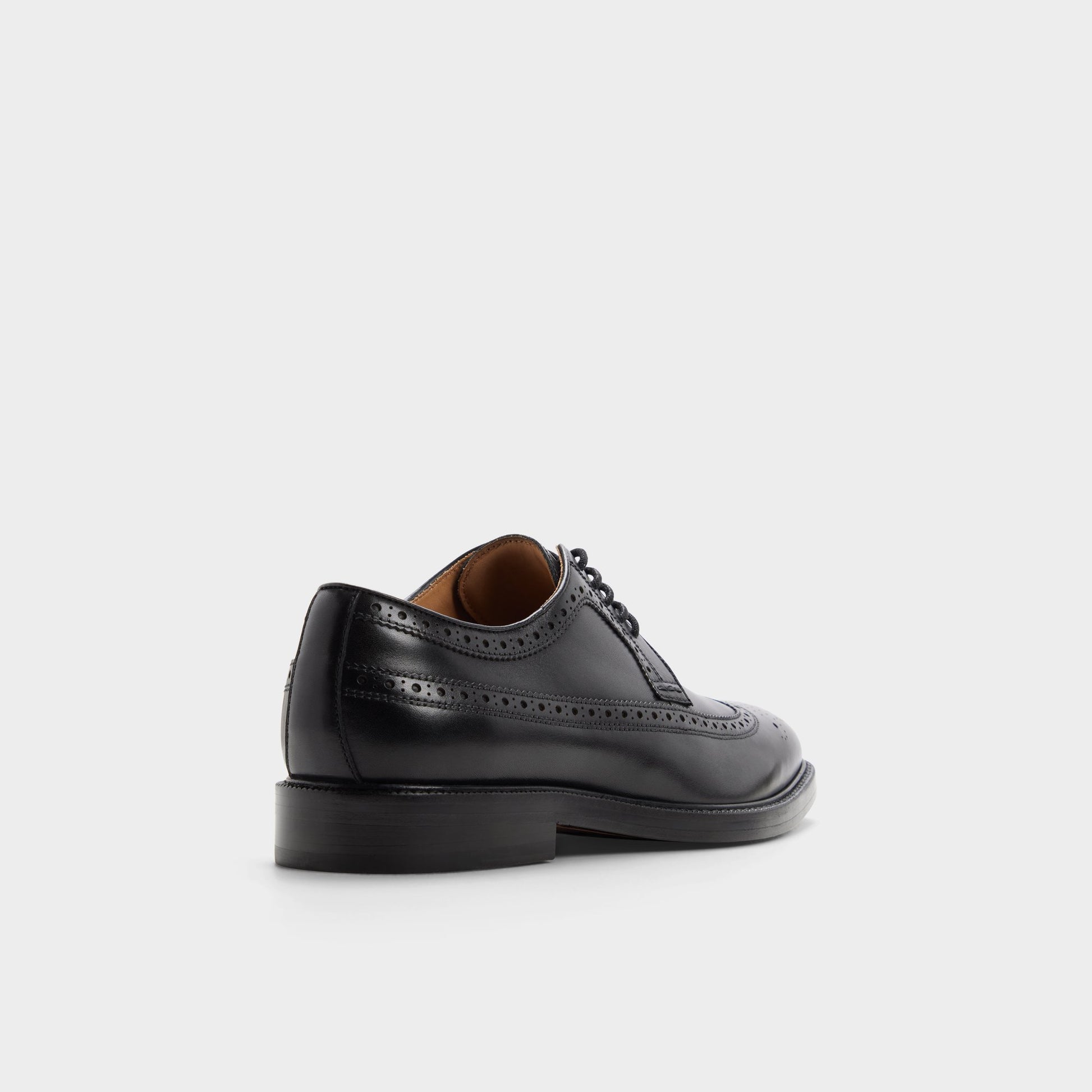 Three-quarter angle of Black Ricio Brogue lace-up shoe's back side
