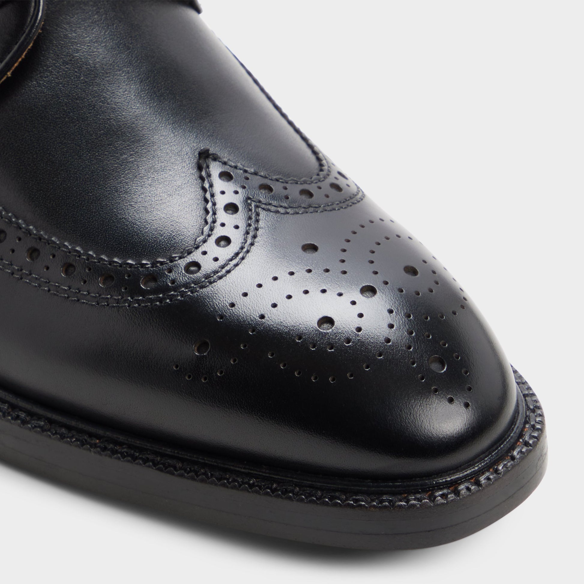 Close-up of the Black Ricio Brogue lace-up shoe