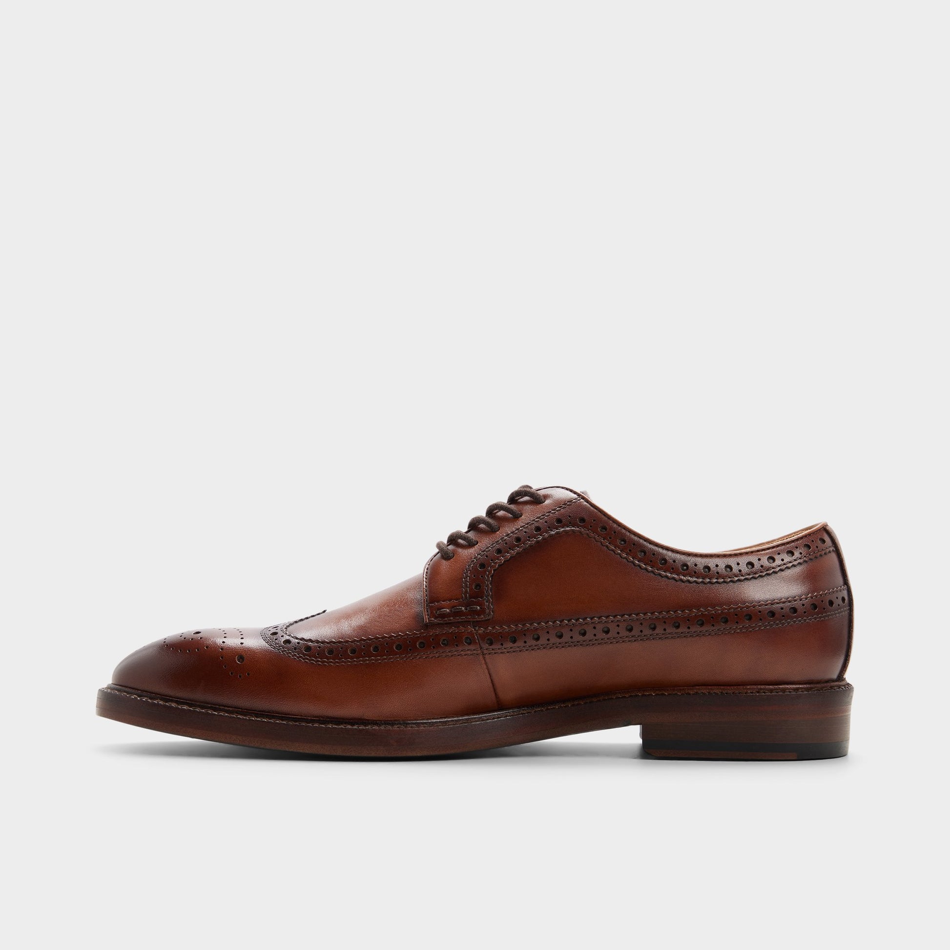 Side view of Cognac Ricio Brogue lace-up shoe