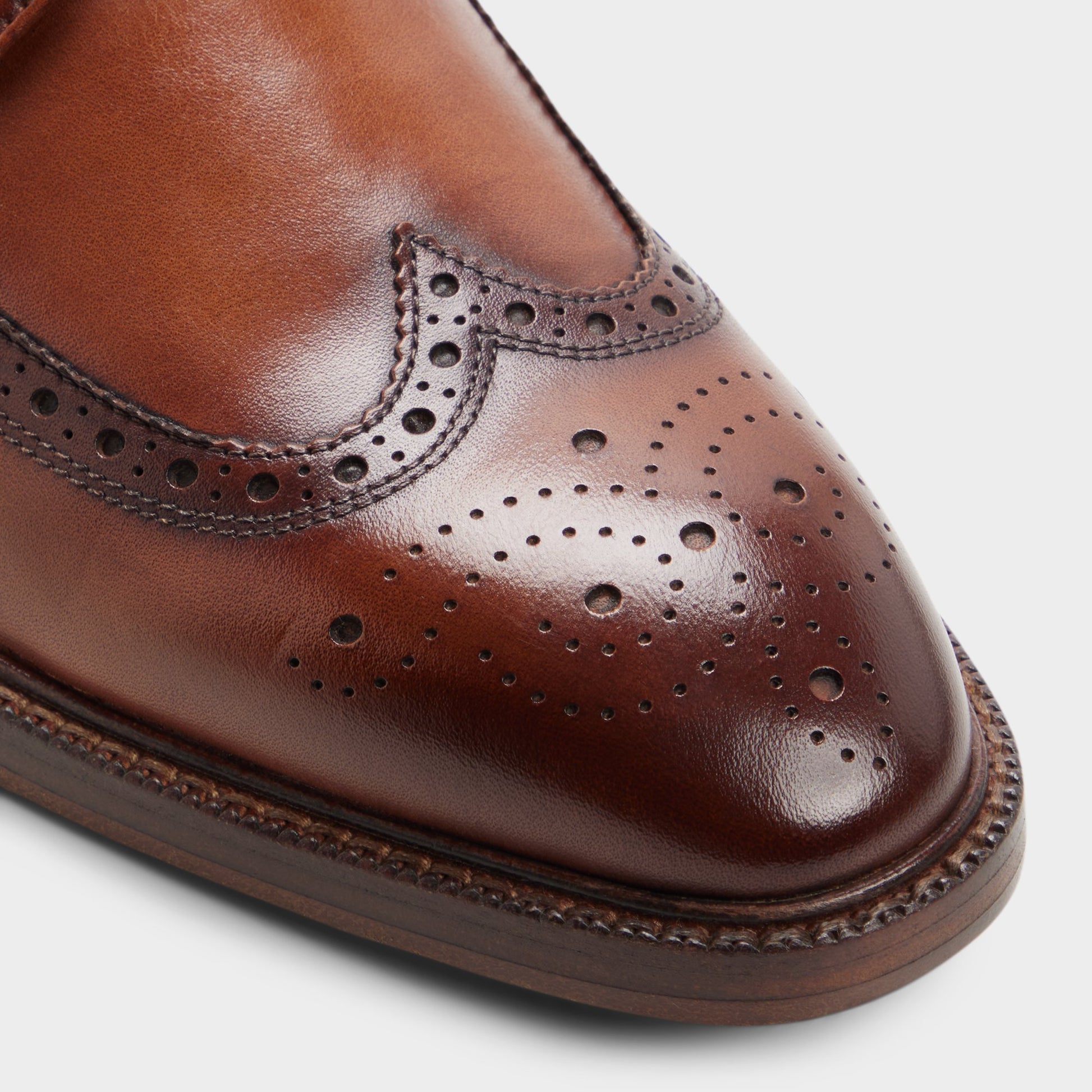 Close-up of the Cognac Ricio Brogue lace-up shoe