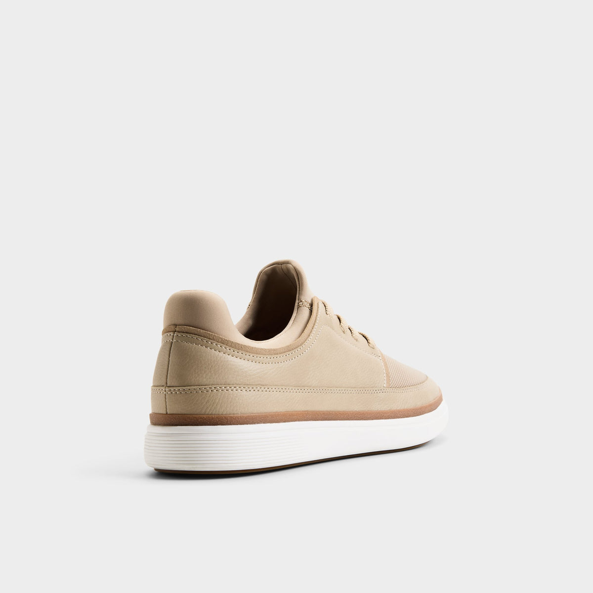 Three-quarter angle of Beige Kurtis Low top sneaker's back side