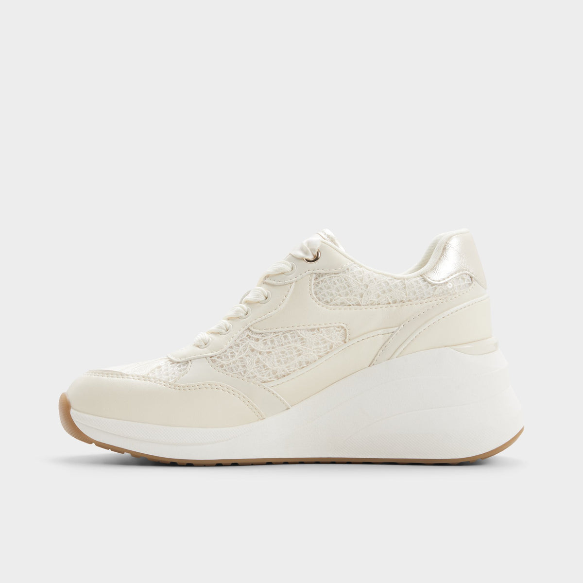 Side view of White/bone Asiejan