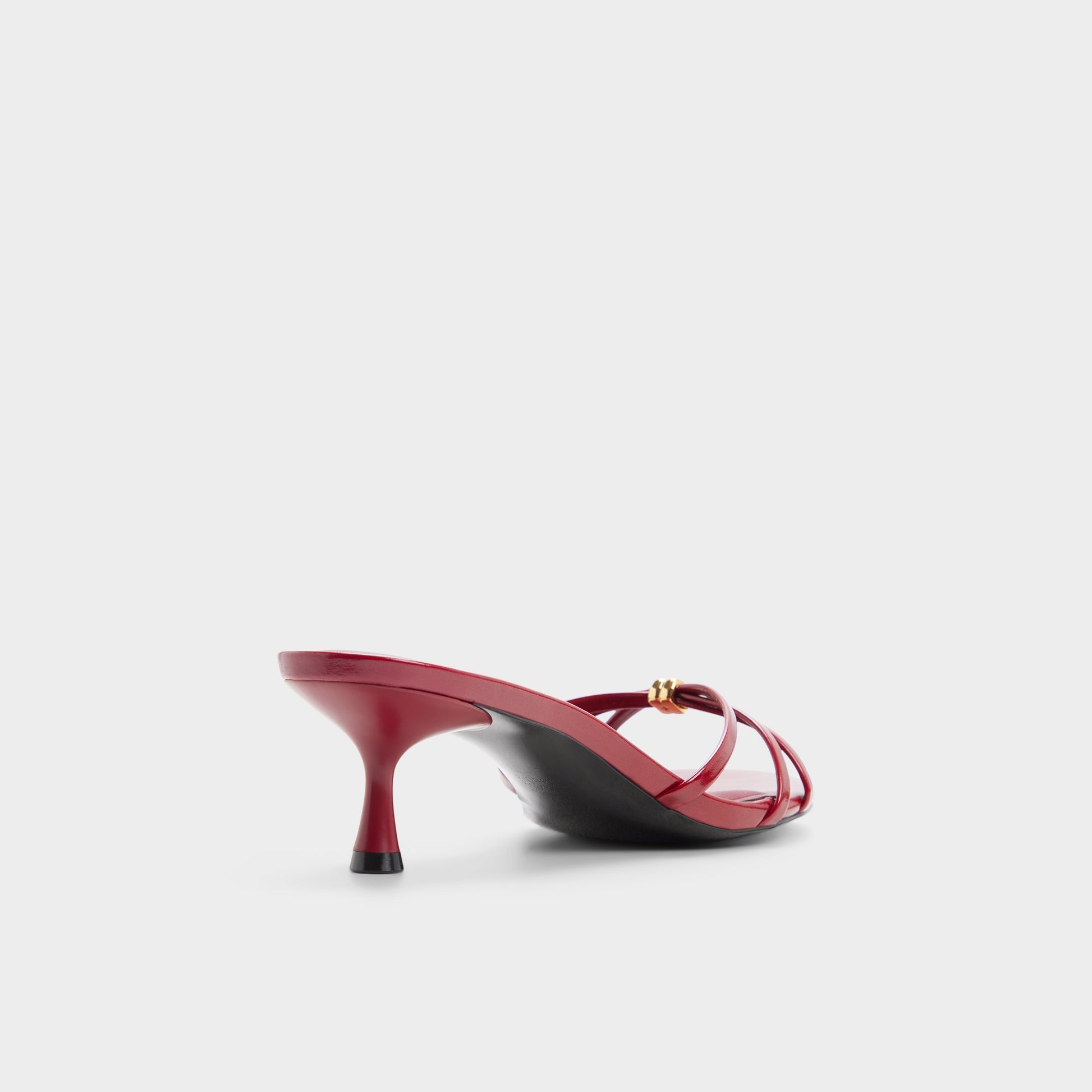 Three-quarter angle of Dark red Madalyn Heeled mule's back side