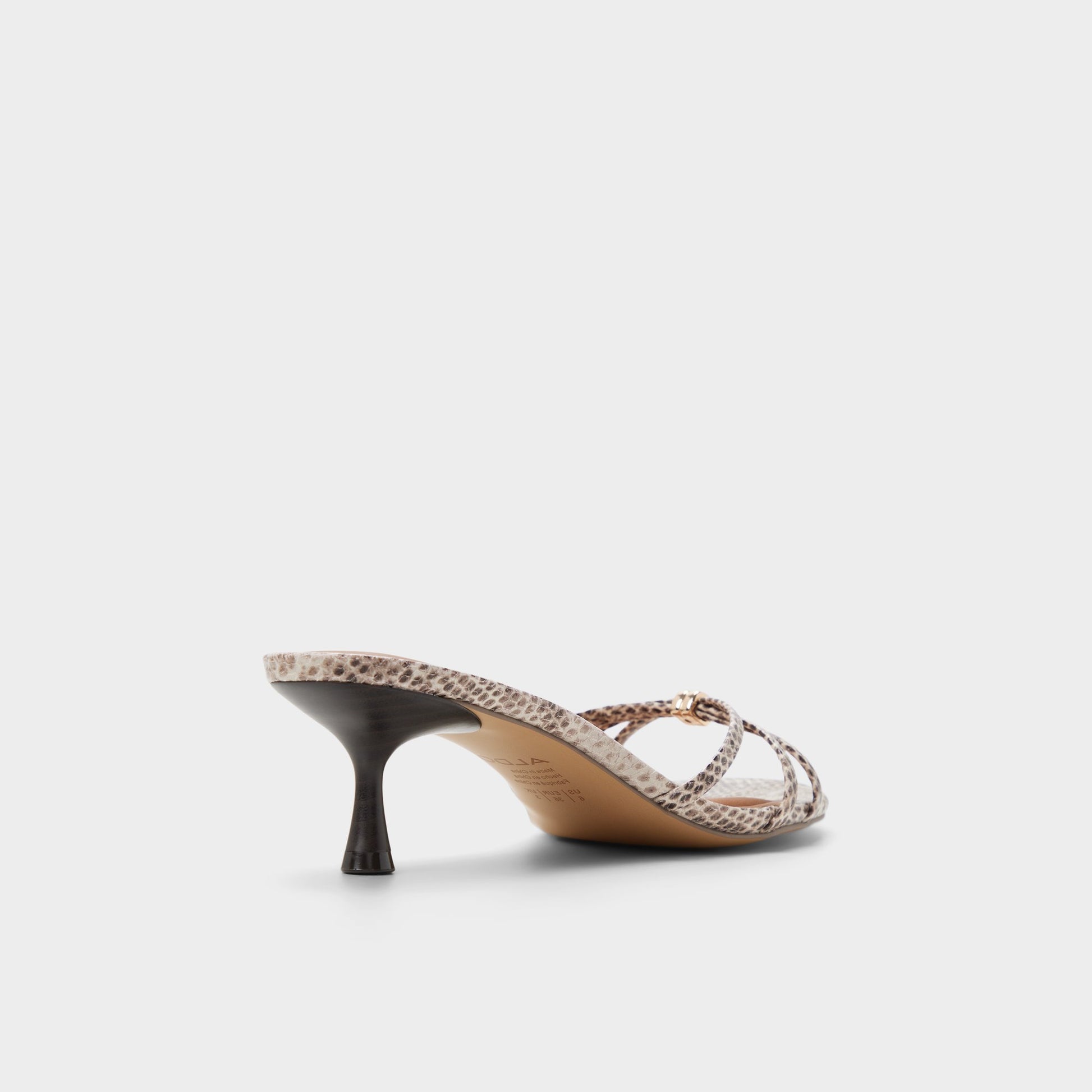 Three-quarter angle of Grey multi Madalyn Heeled mule's back side