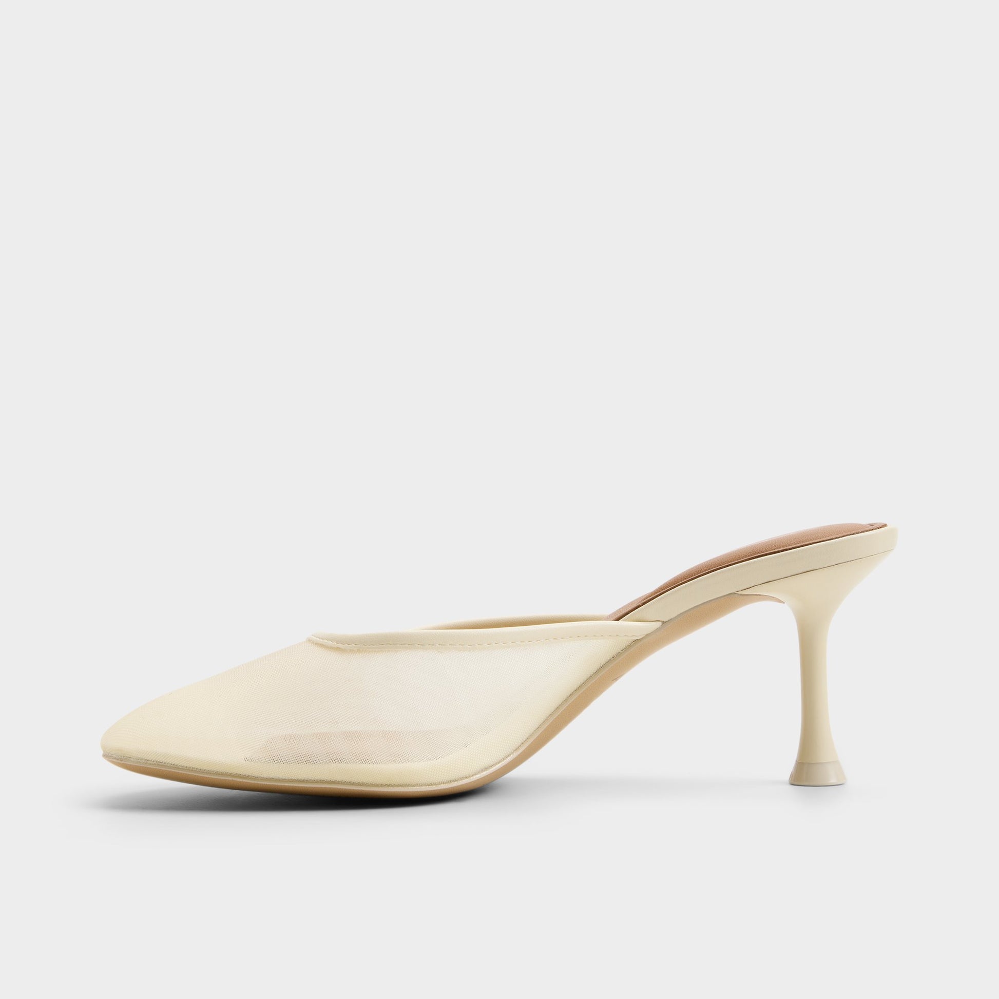 Side view of Light yellow Cristelle Heeled mule