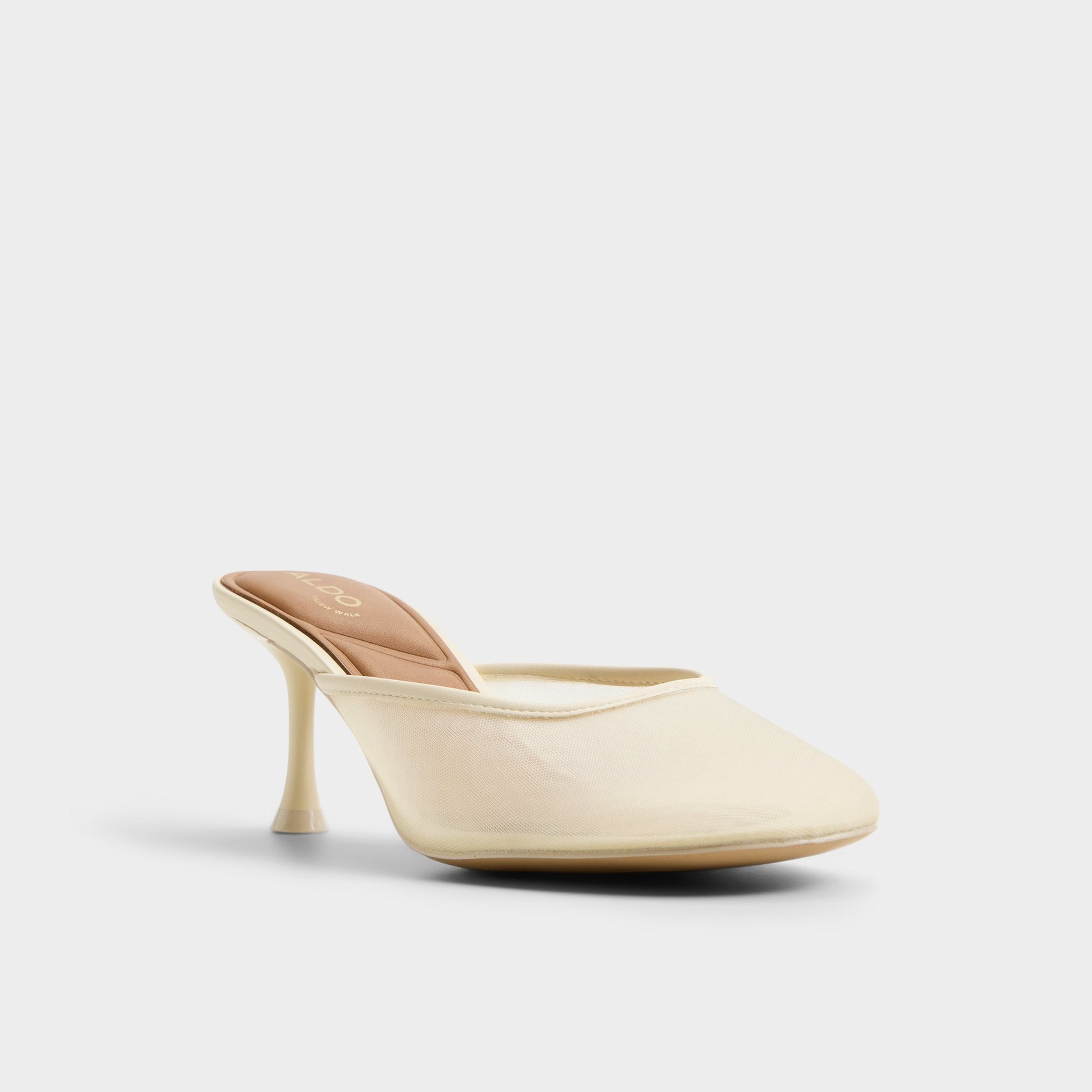 Three-quarter angle of Light yellow Cristelle Heeled mule's front side