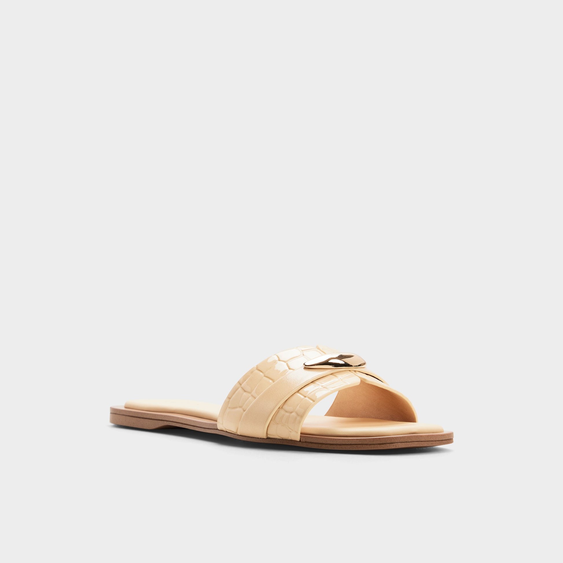 Three-quarter angle of Light yellow Briela Slide sandal's front side