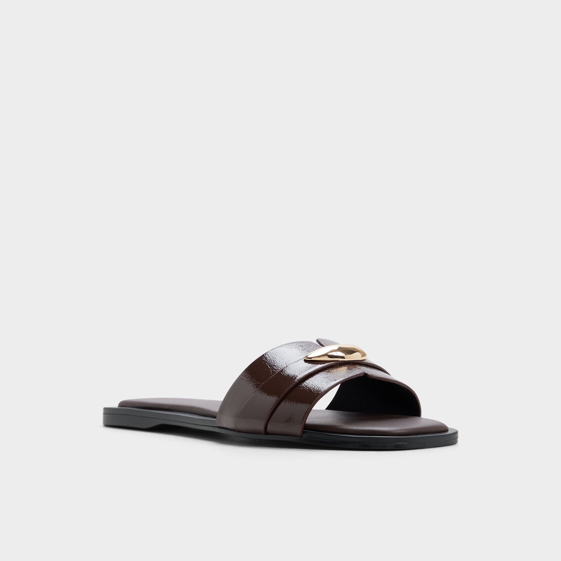 Three-quarter angle of Dark brown Briela Slide sandal's front side