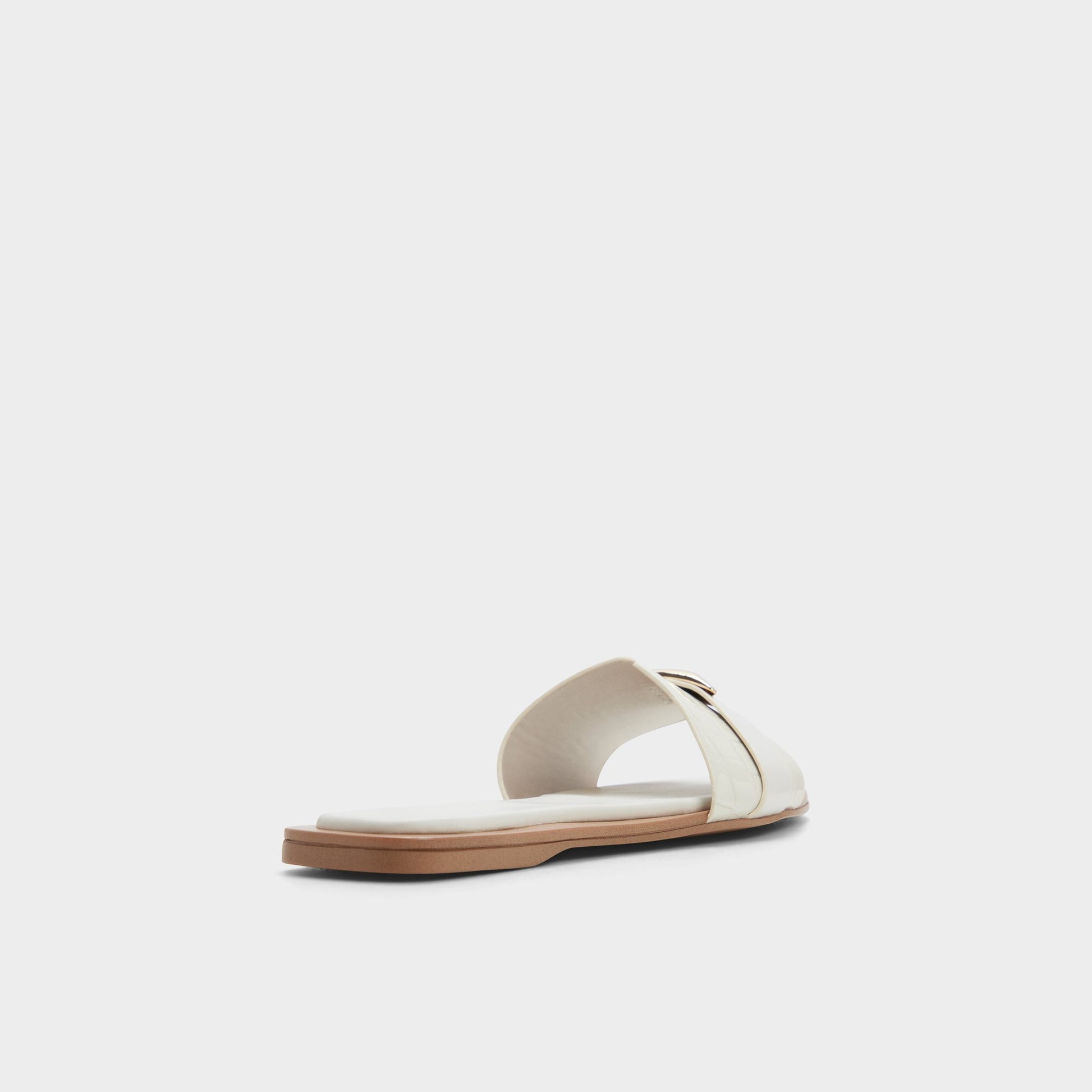 Three-quarter angle of White/bone Briela Slide sandal's back side
