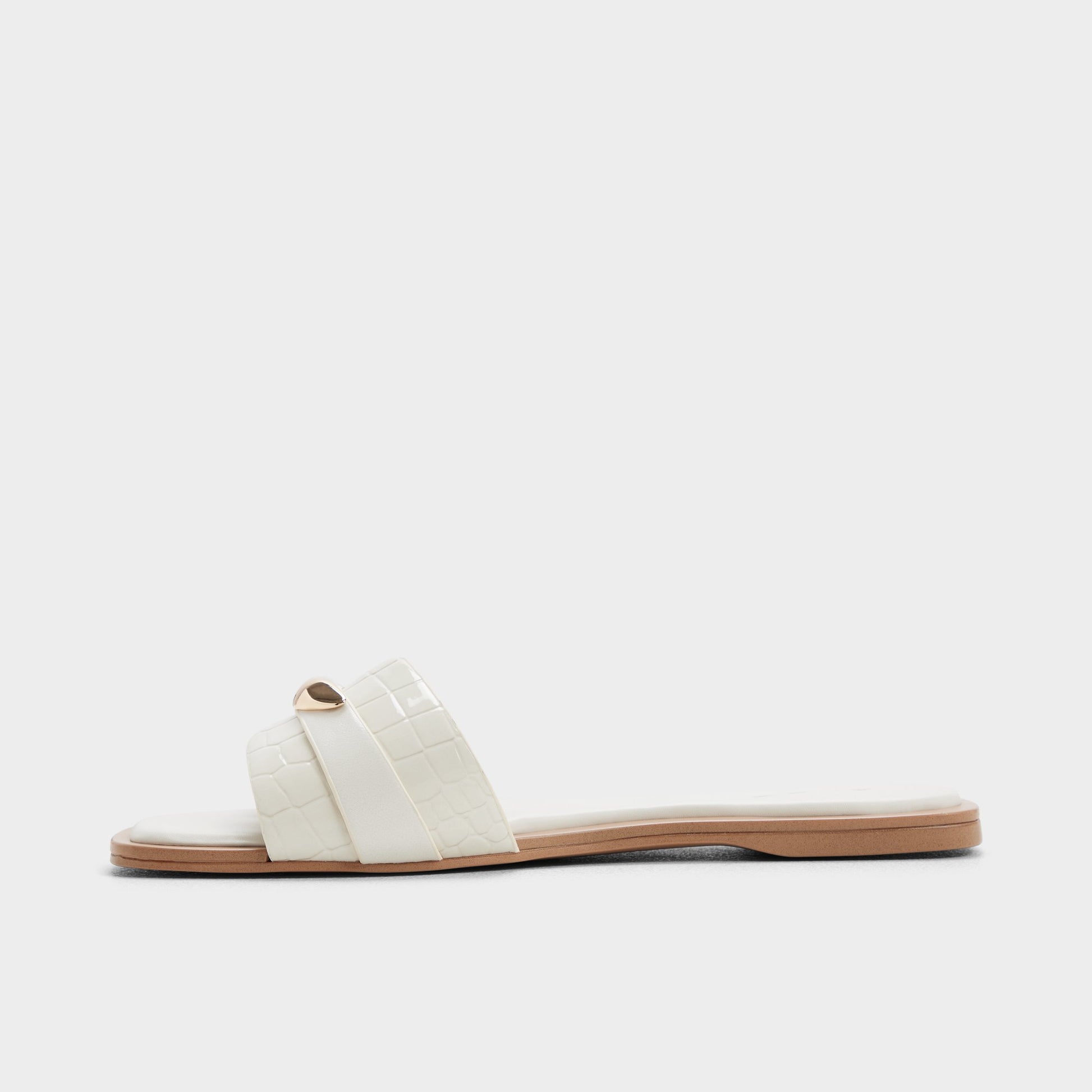 Side view of White/bone Briela Slide sandal
