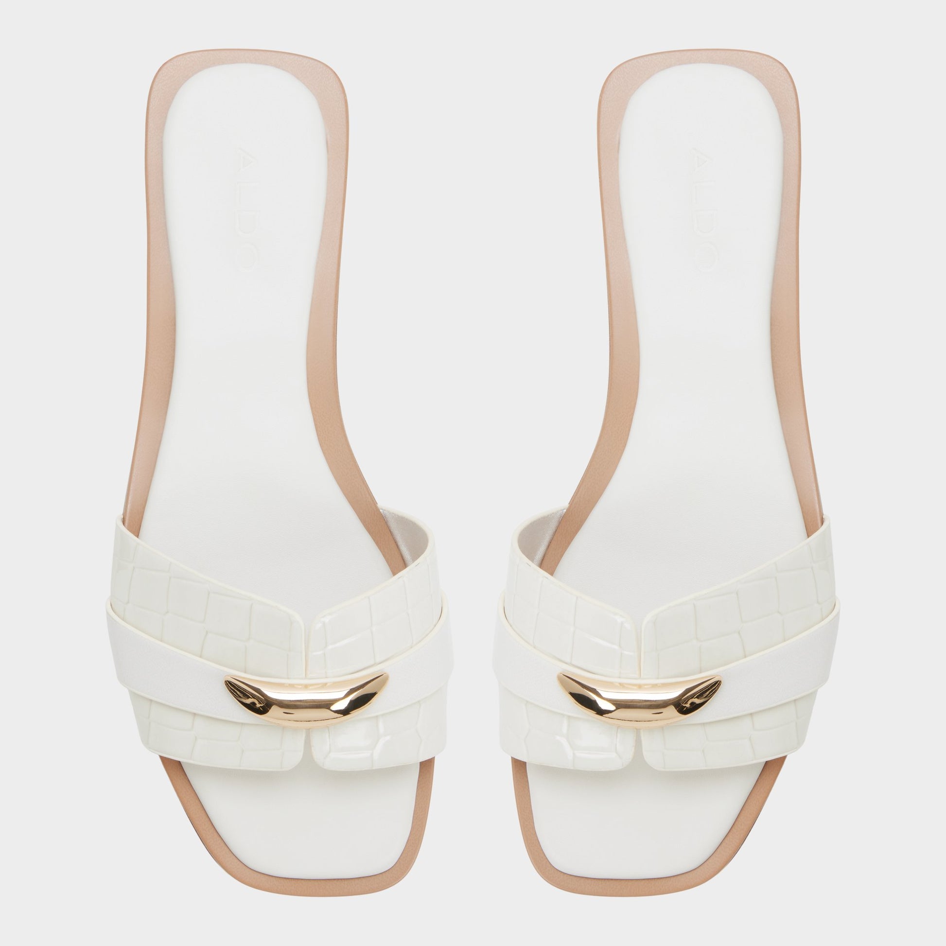 Top-down view of the White/bone Briela Slide sandal