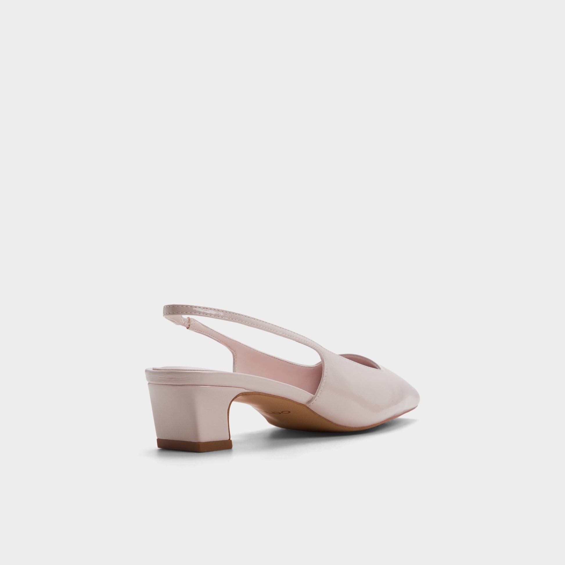 Three-quarter angle of Light pink Harretta Slingback heel's back side