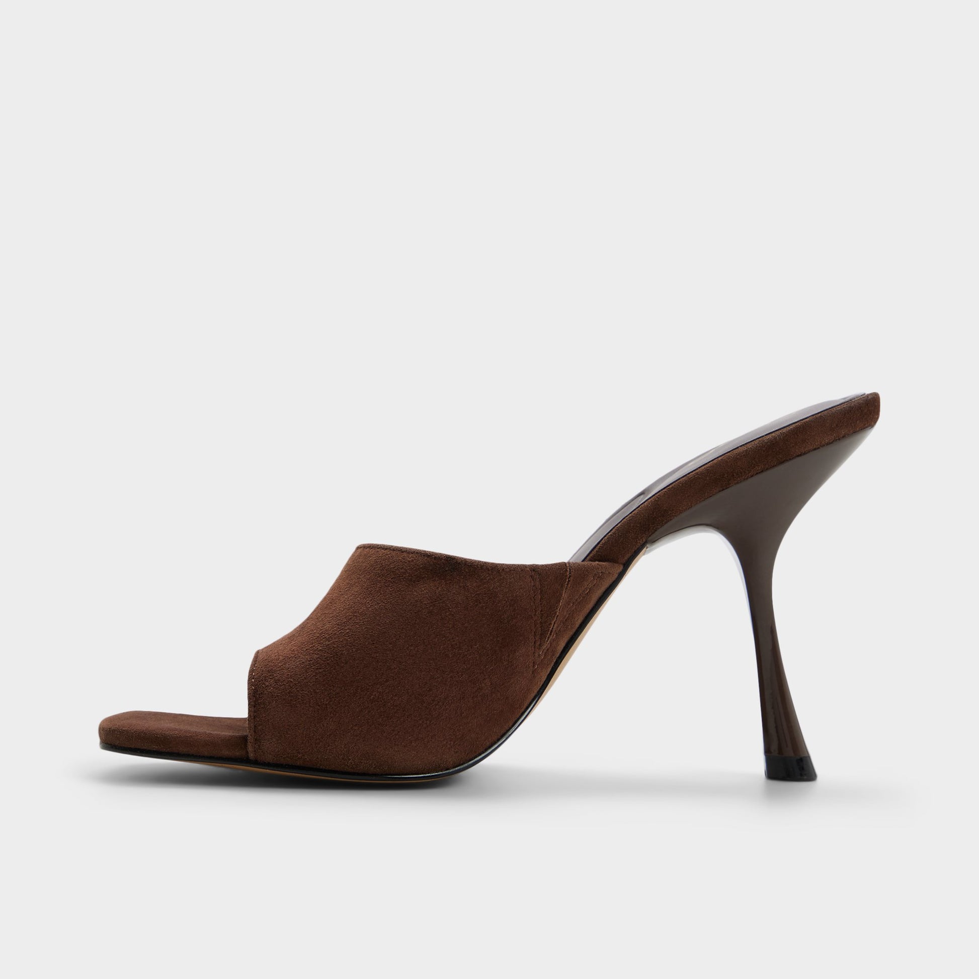 Side view of Dark brown Comacan Heeled mule