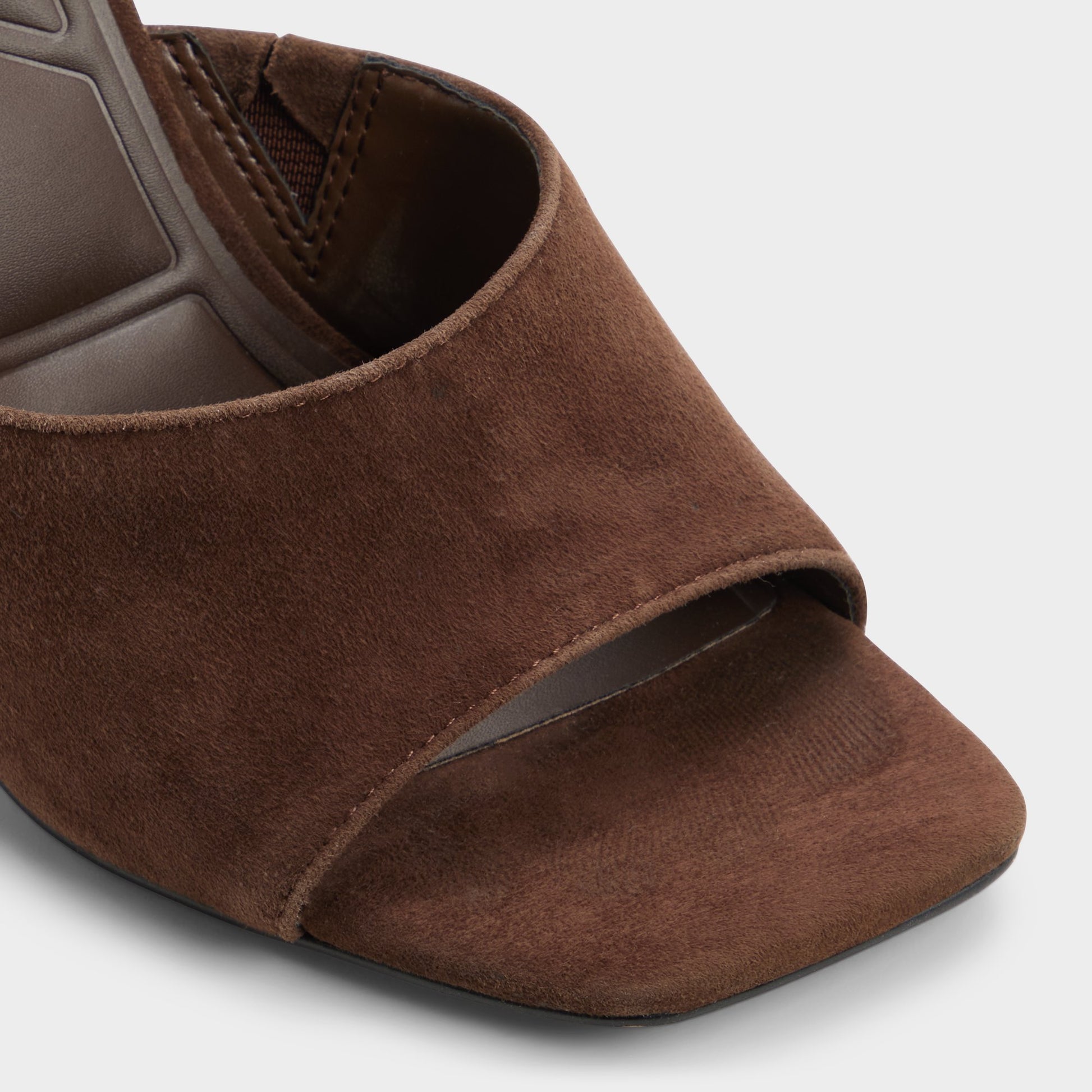 Close-up of the Dark brown Comacan Heeled mule