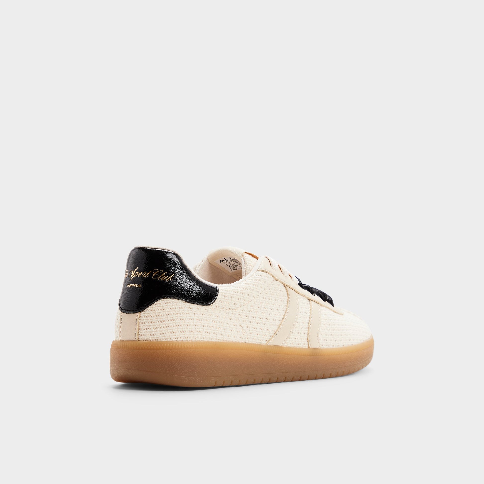 Three-quarter angle of Cream/blk Chicsneaker Sneaker's back side