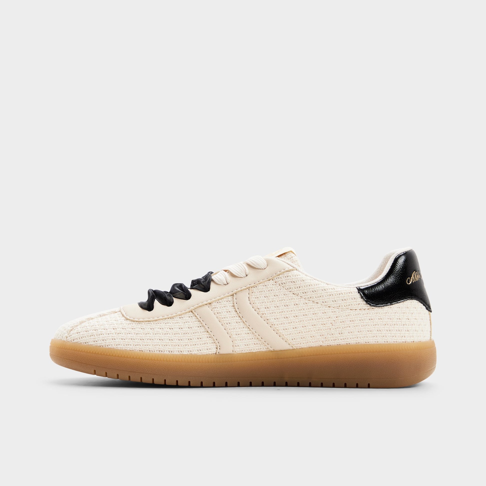 Side view of Cream/blk Chicsneaker Sneaker