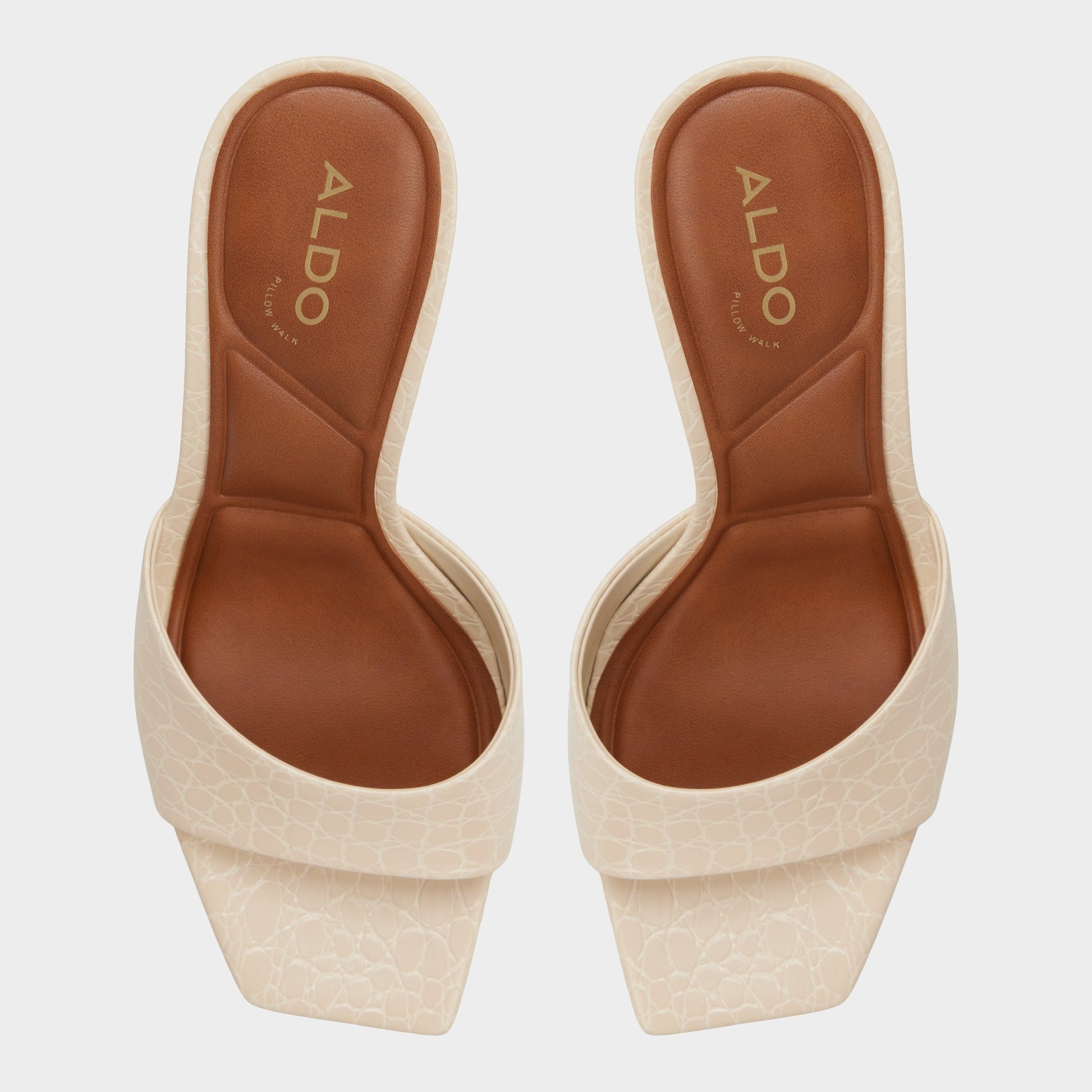 Top-down view of the Cream Biscuiit Heeled mule