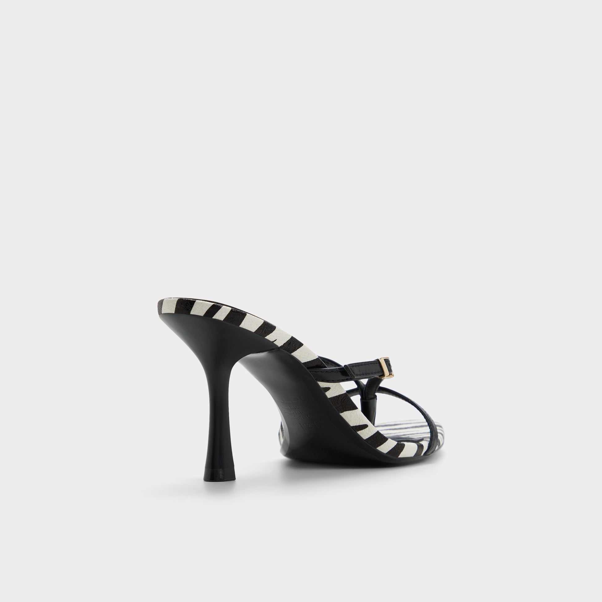 Three-quarter angle of Black/white Broney Strappy heeled sandal's back side