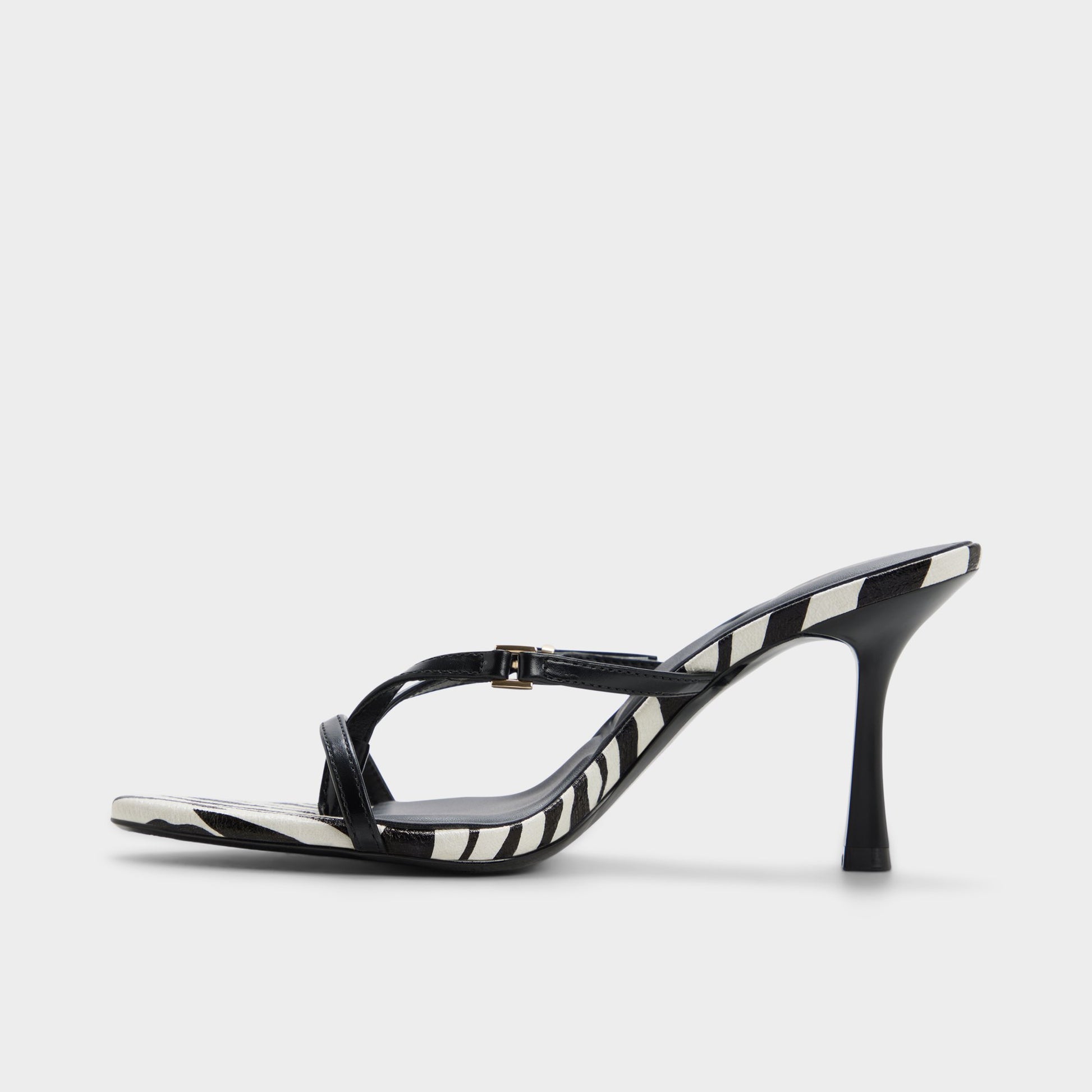Side view of Black/white Broney Strappy heeled sandal