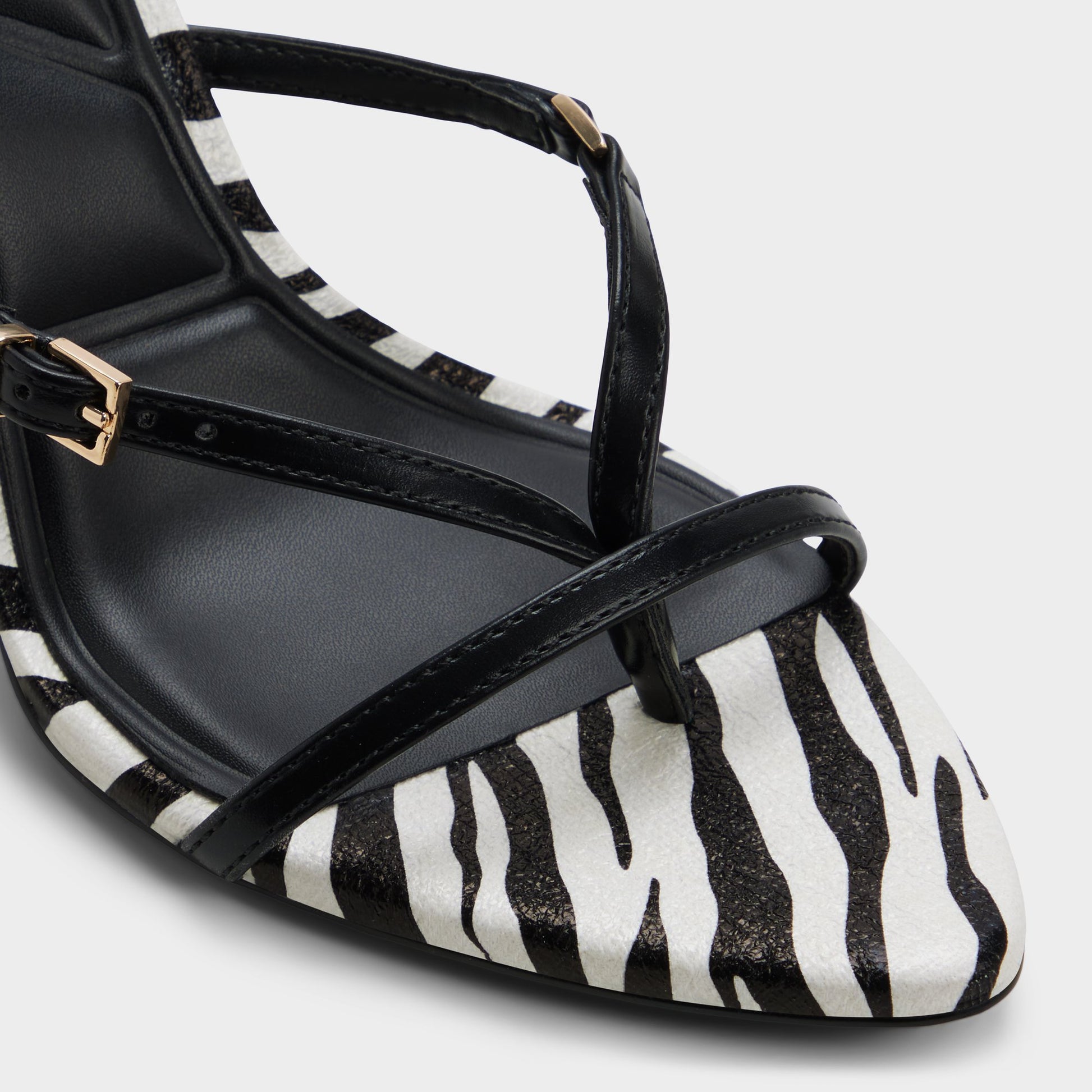 Close-up of the Black/white Broney Strappy heeled sandal