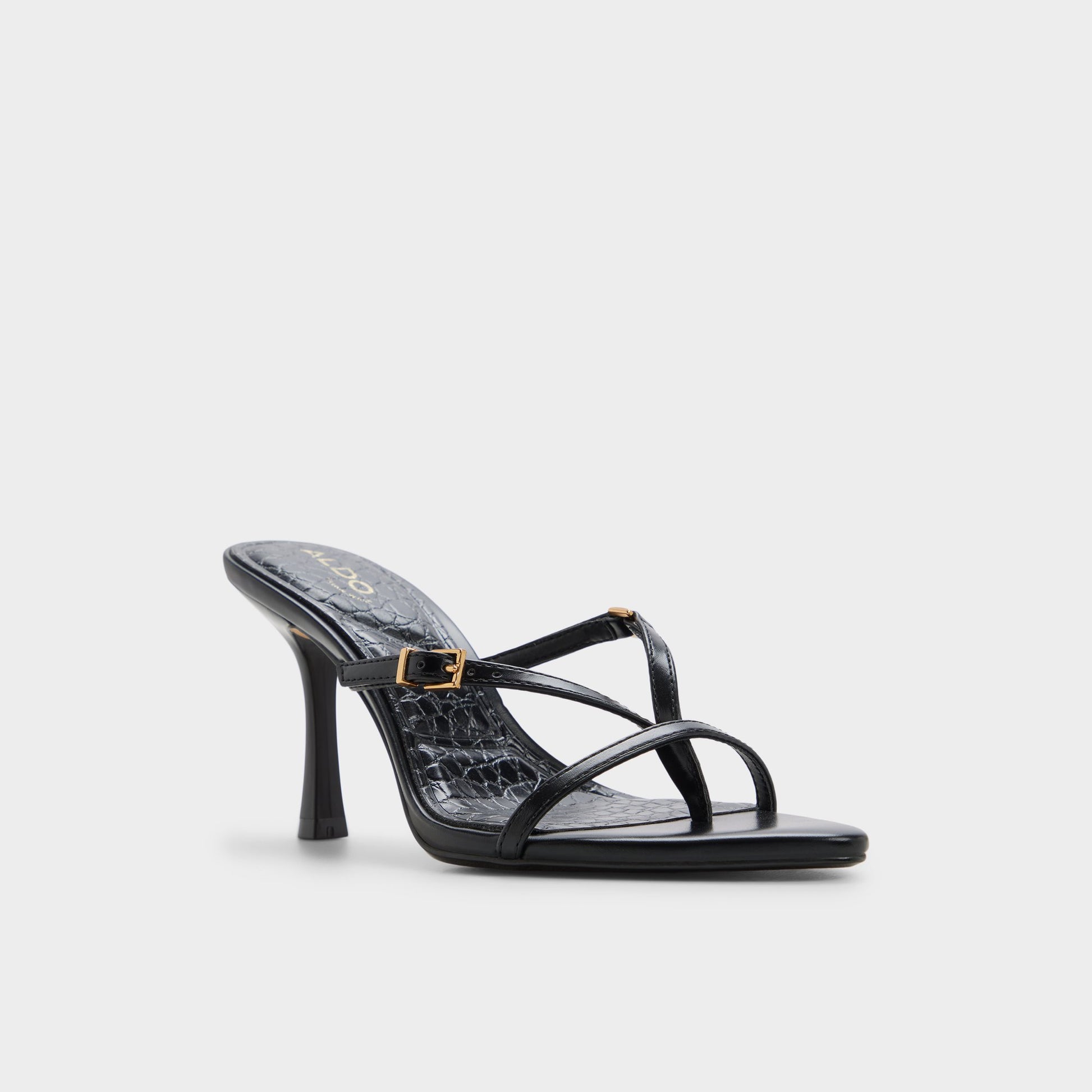 Three-quarter angle of Black Broney Strappy heeled sandal's front side