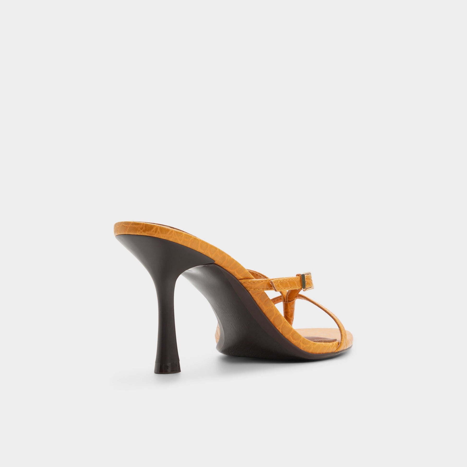Three-quarter angle of Dark yellow Broney Strappy heeled sandal's back side
