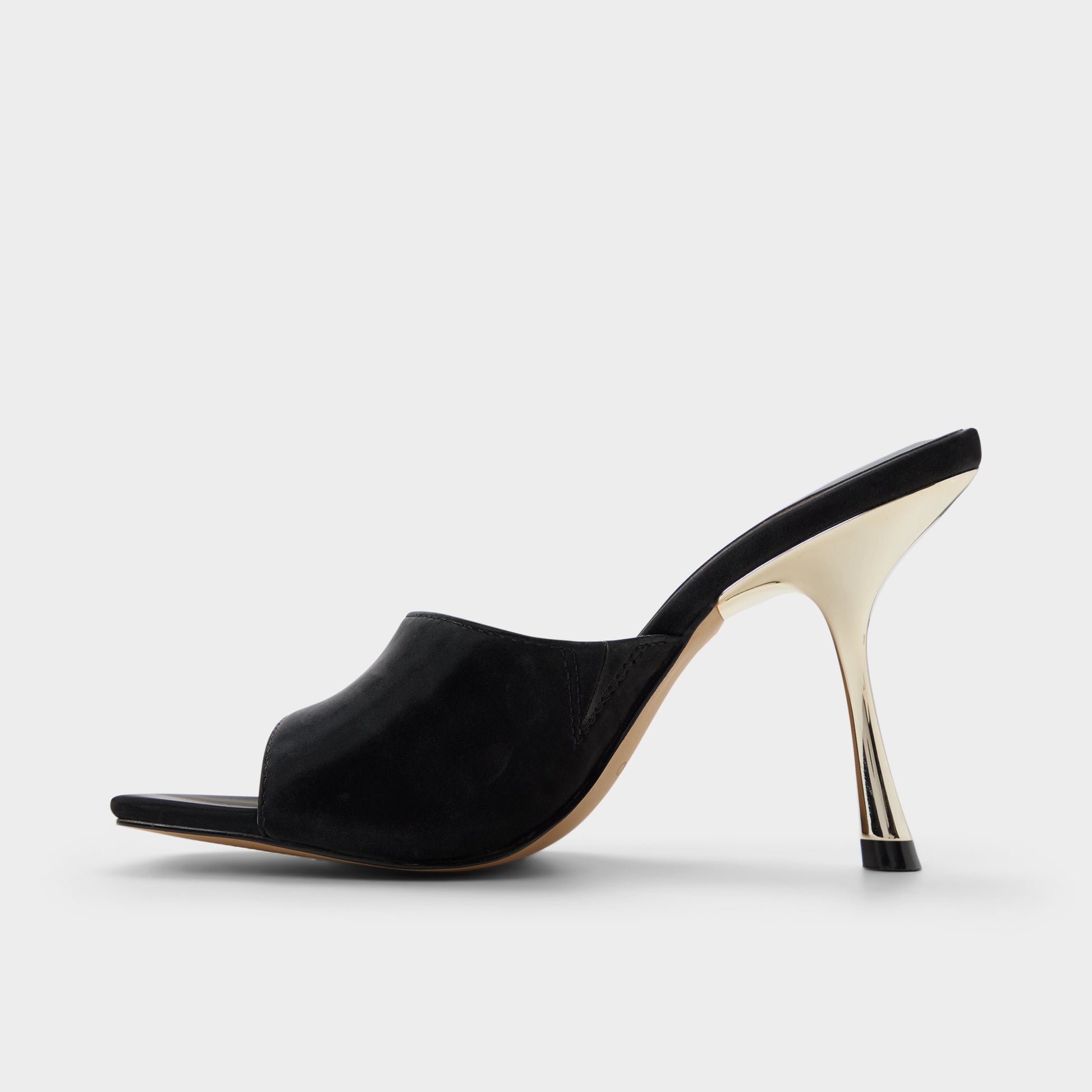Side view of Black Comacan Heeled mule