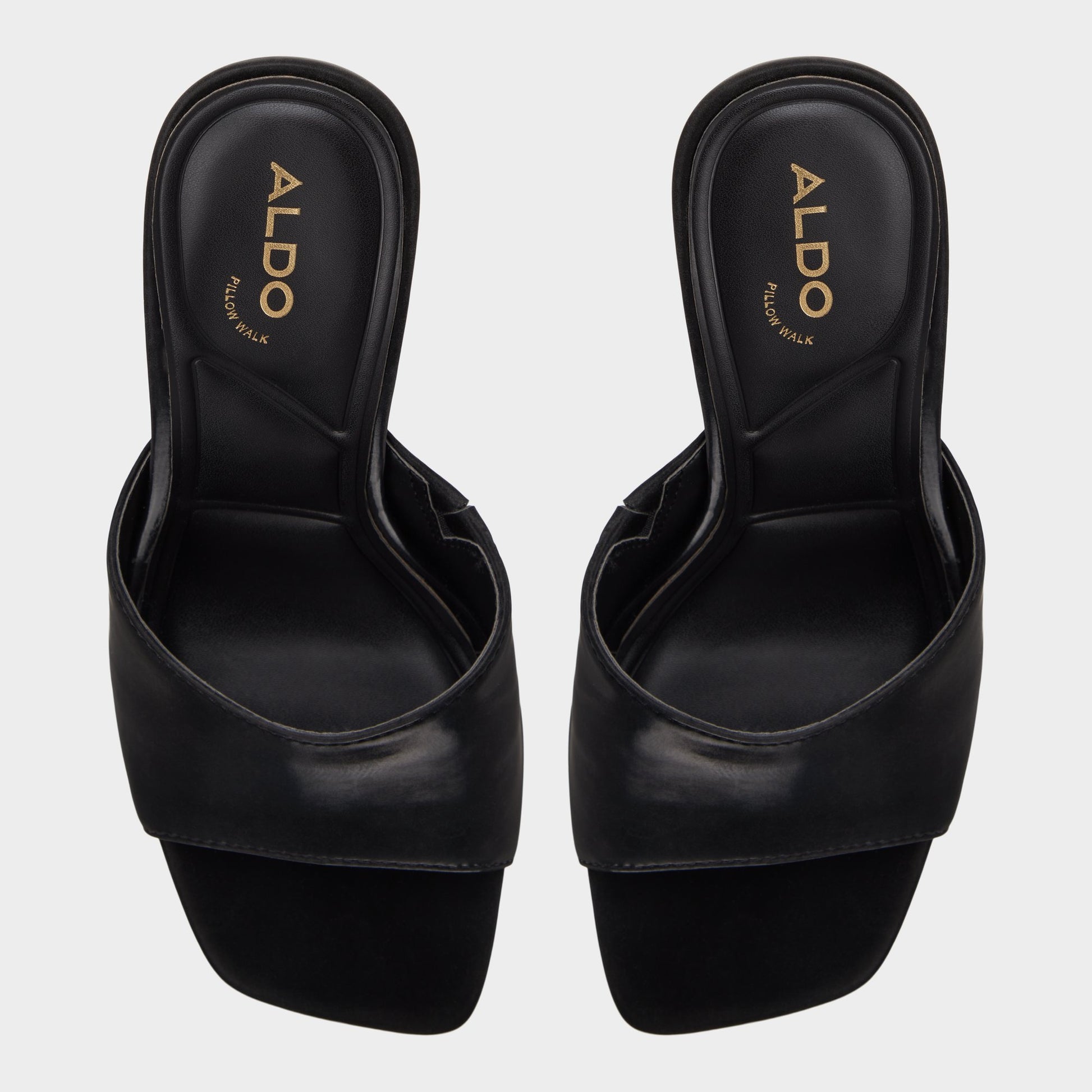 Top-down view of the Black Comacan Heeled mule