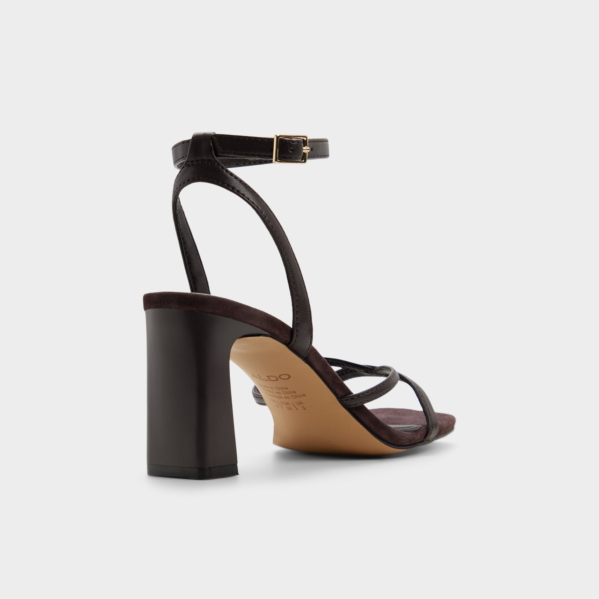 Three-quarter angle of Dark brown Stellare Strappy heeled sandal's back side
