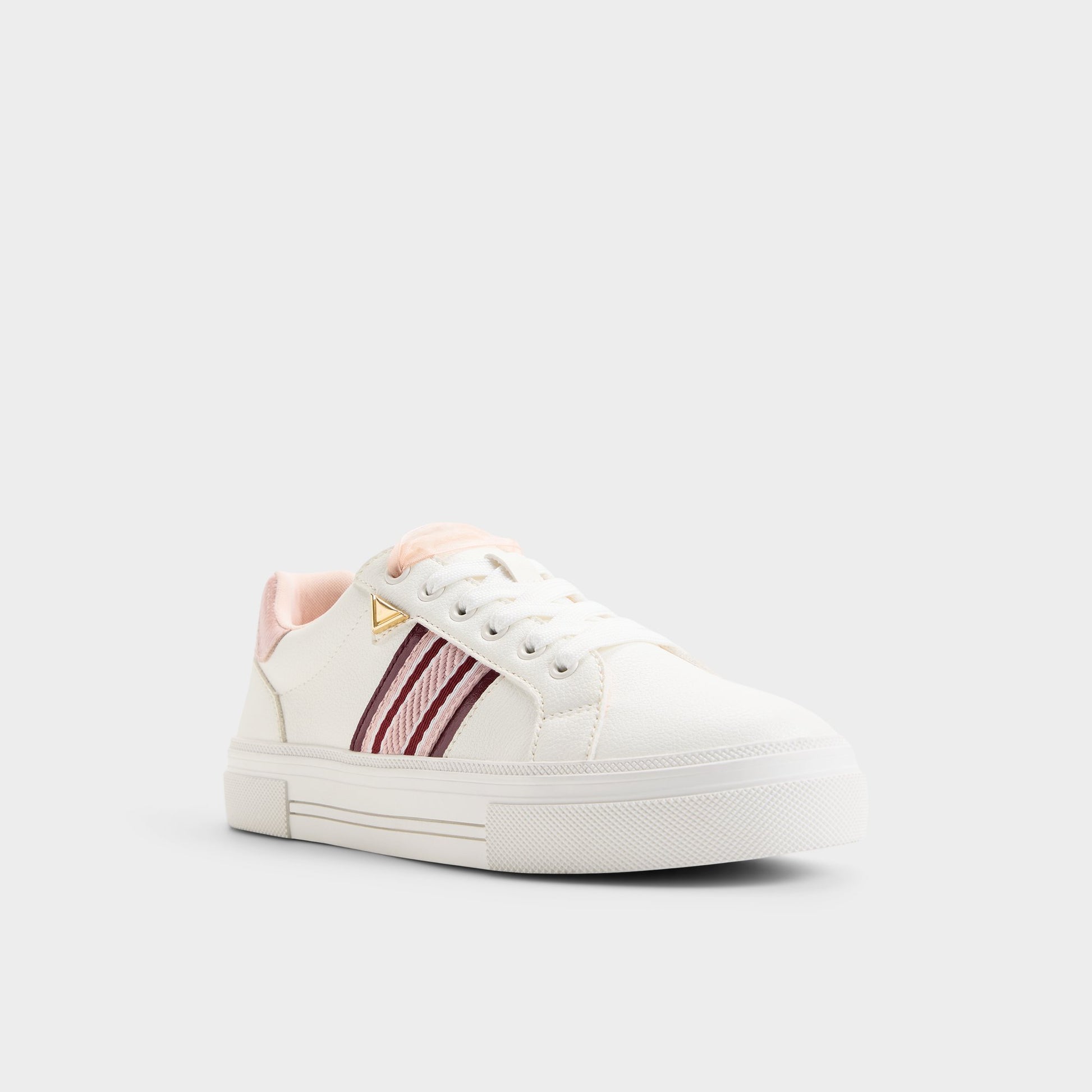 Three-quarter angle of White combo Saddie 's front side