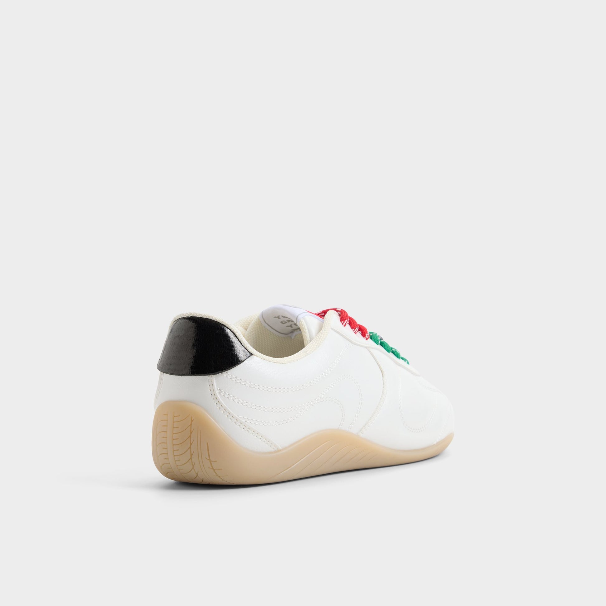 Three-quarter angle of White Maximum Sneaker's back side