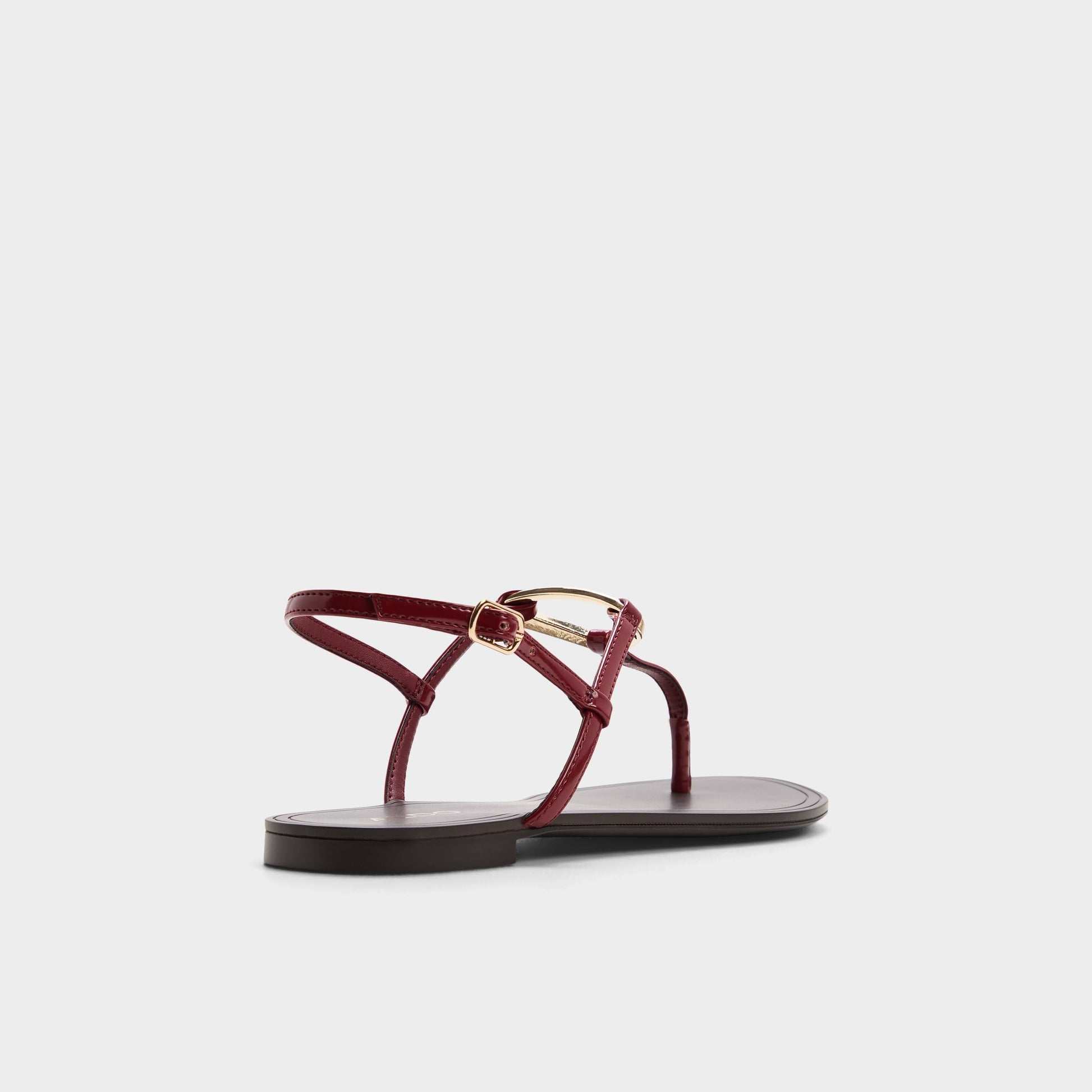 Three-quarter angle of Dark red Alannah T-strap sandal's back side