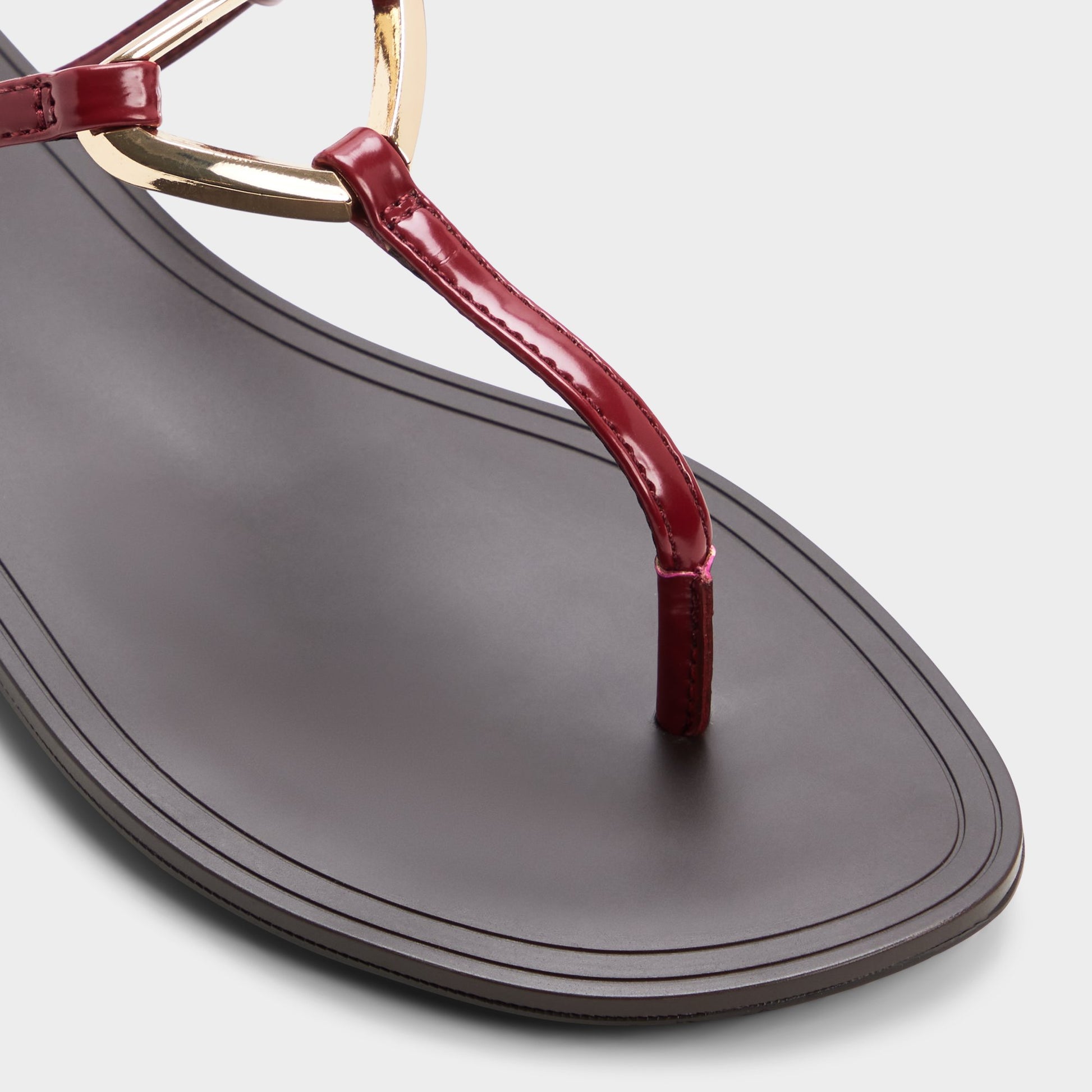 Close-up of the Dark red Alannah T-strap sandal