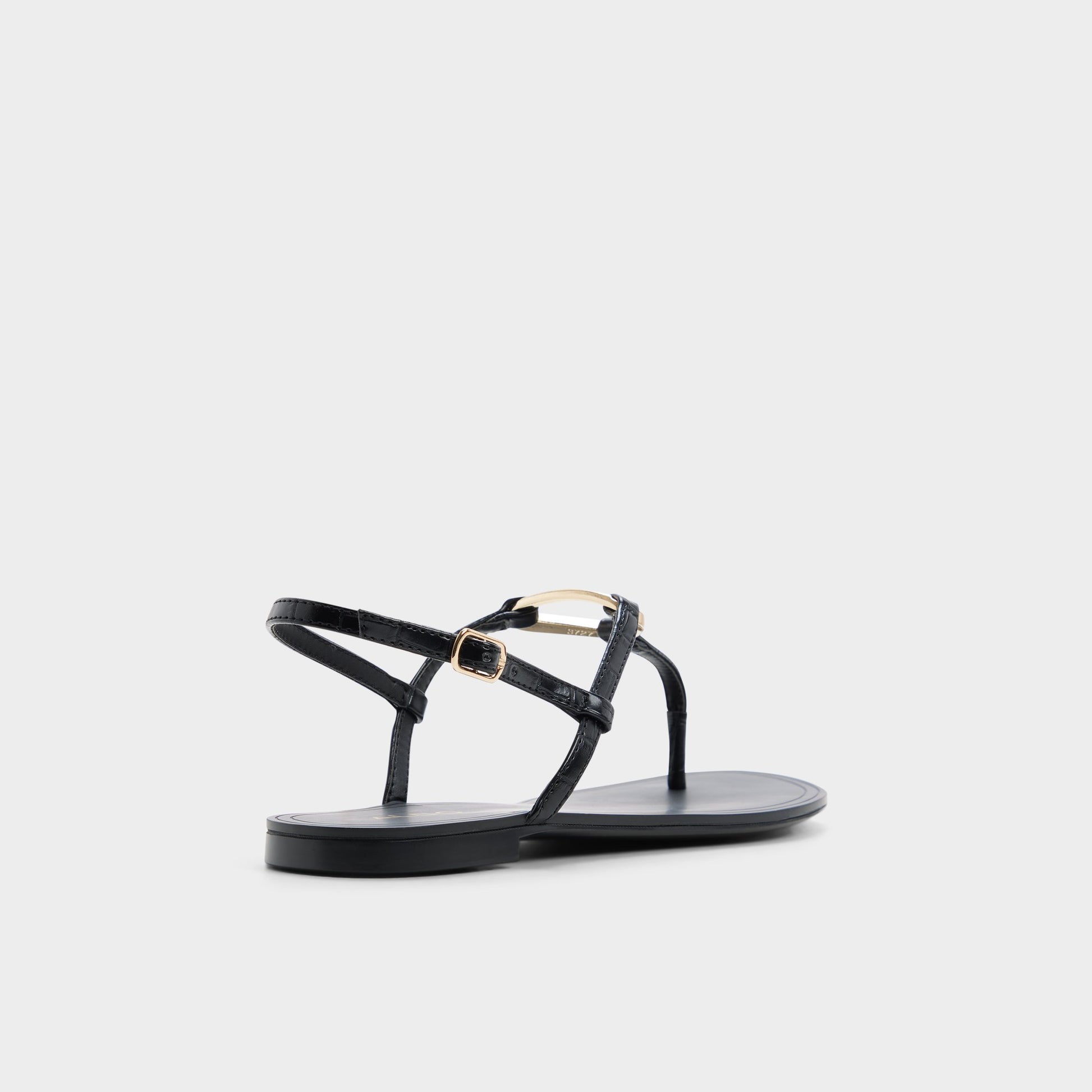 Three-quarter angle of Black Alannah T-strap sandal's back side