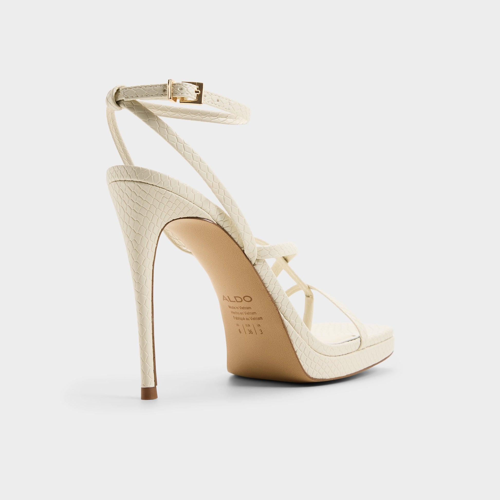 Three-quarter angle of Cream Cleadonn Strappy platform sandal's back side
