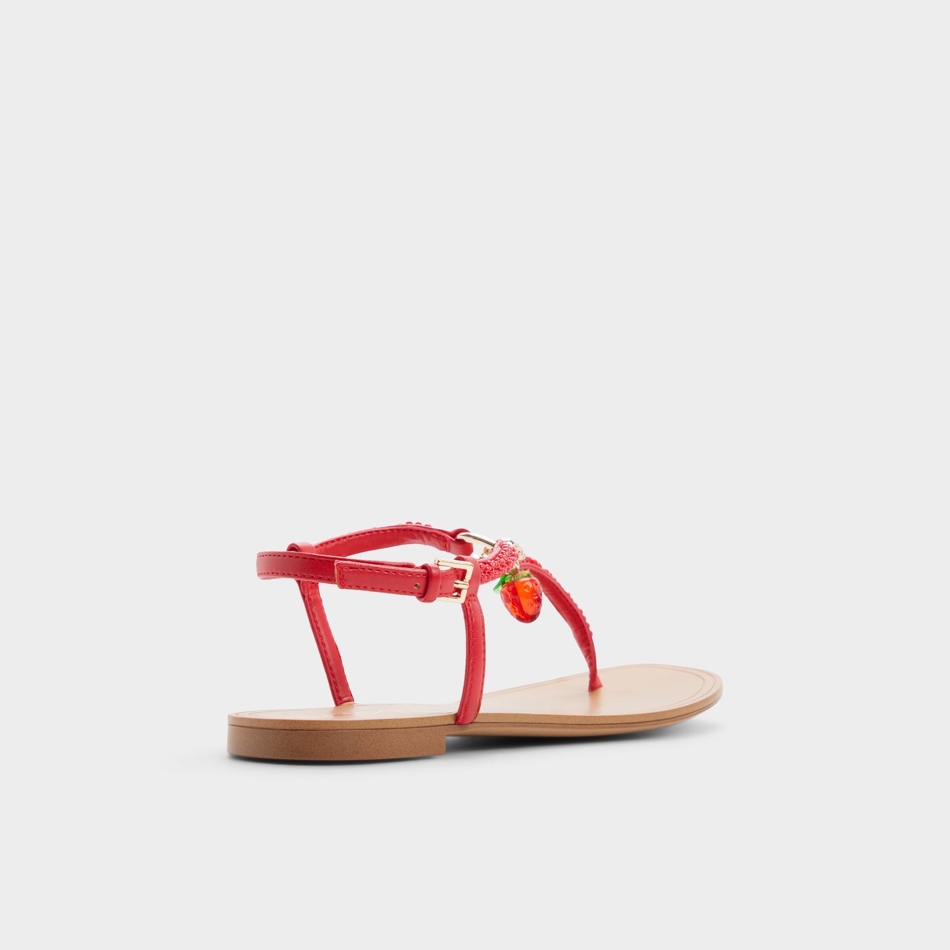 Three-quarter angle of Bright red Fraisie T-strap sandal's back side